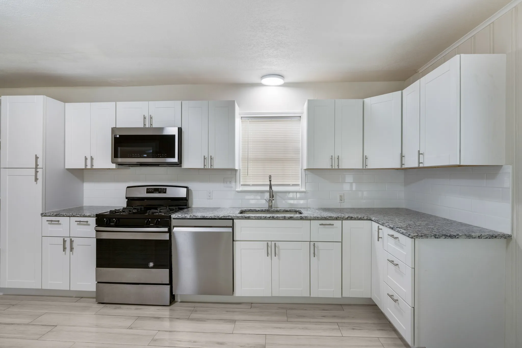 Plenty of cabinets for storage.
