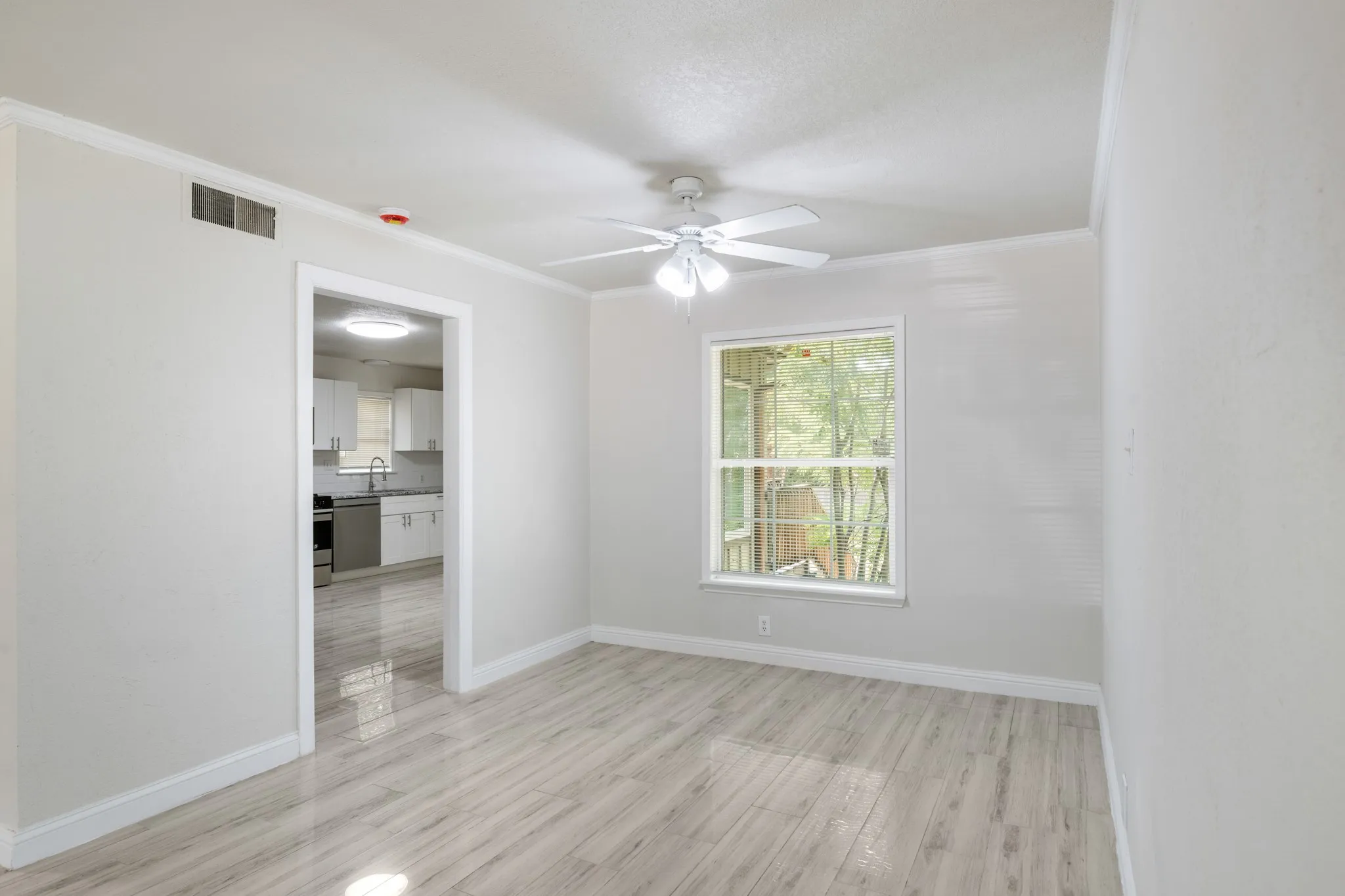 Dining area has a view of the backyard.