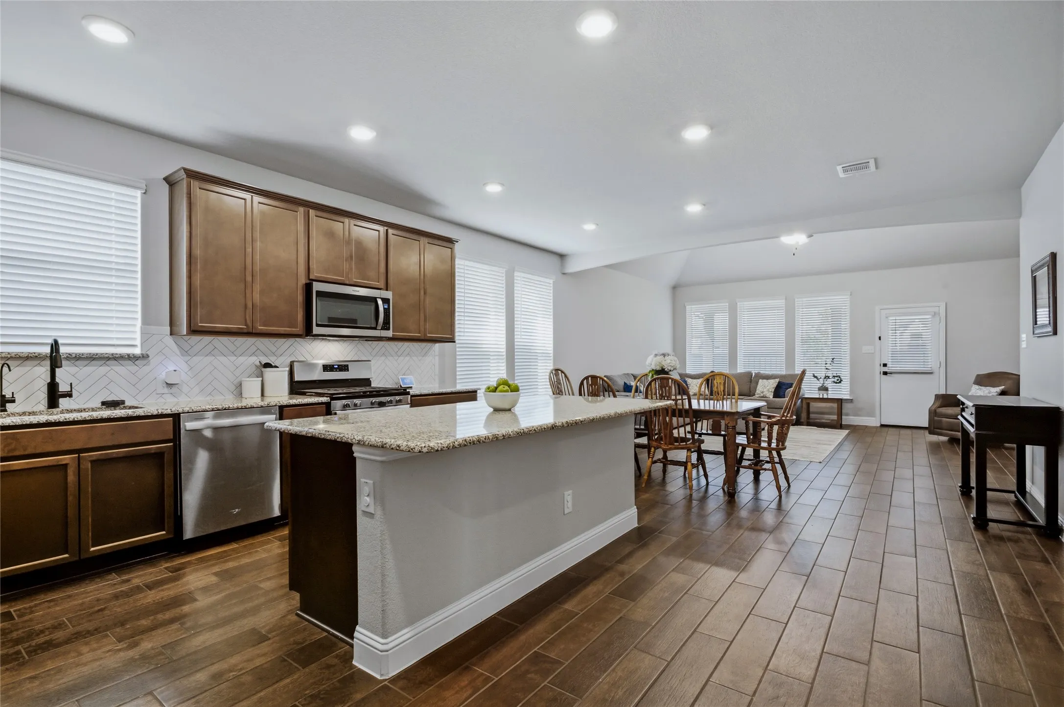 Spacious kitchen and dining area designed for easy everyday living and entertaining.
