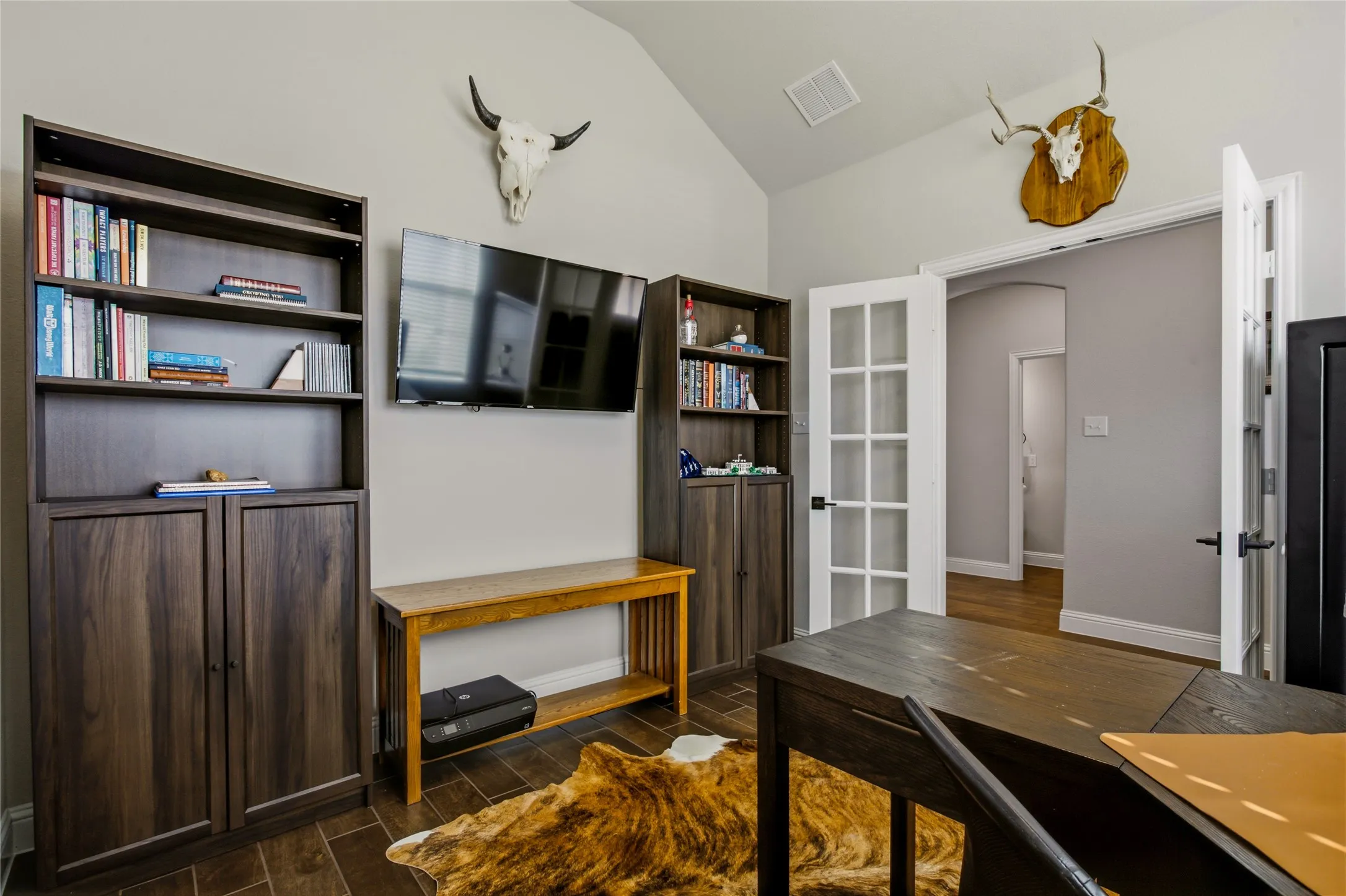 Thoughtfully designed study space with built-in cabinetry and room for organization.