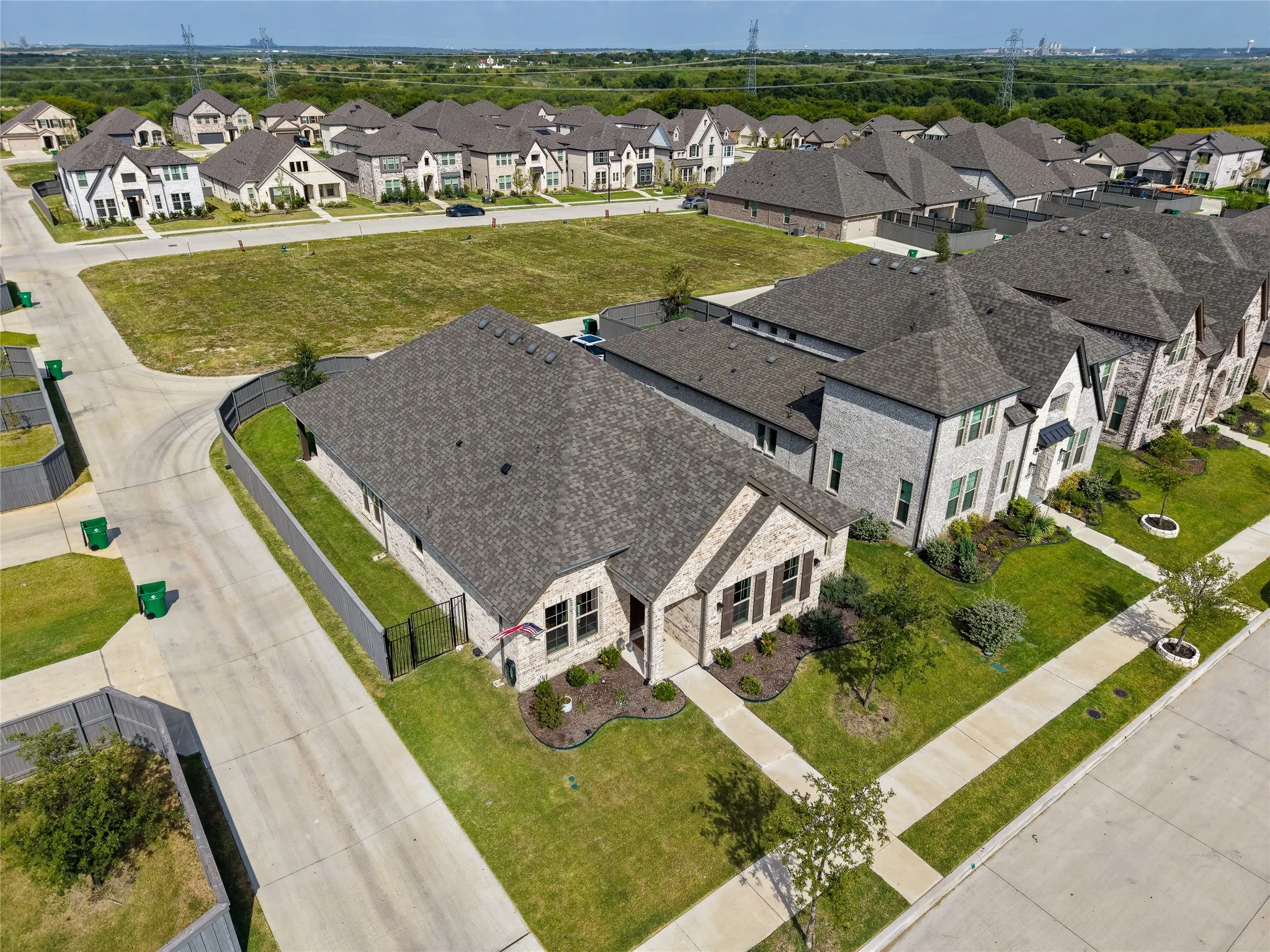 Elevated view highlighting the home's position within the neighborhood and surrounding residential community.