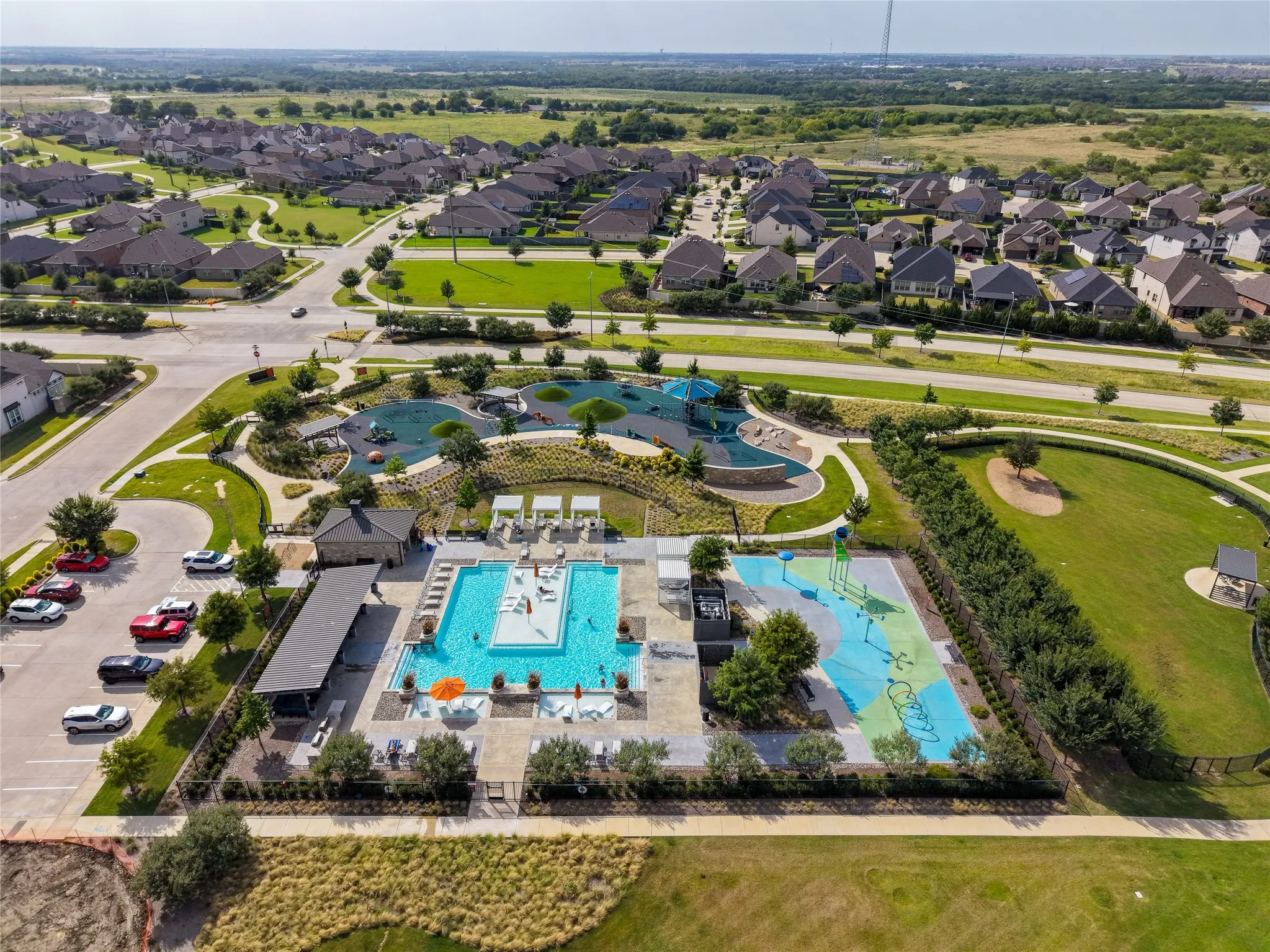 Aerial view showcasing the expansive community recreation and amenity areas.