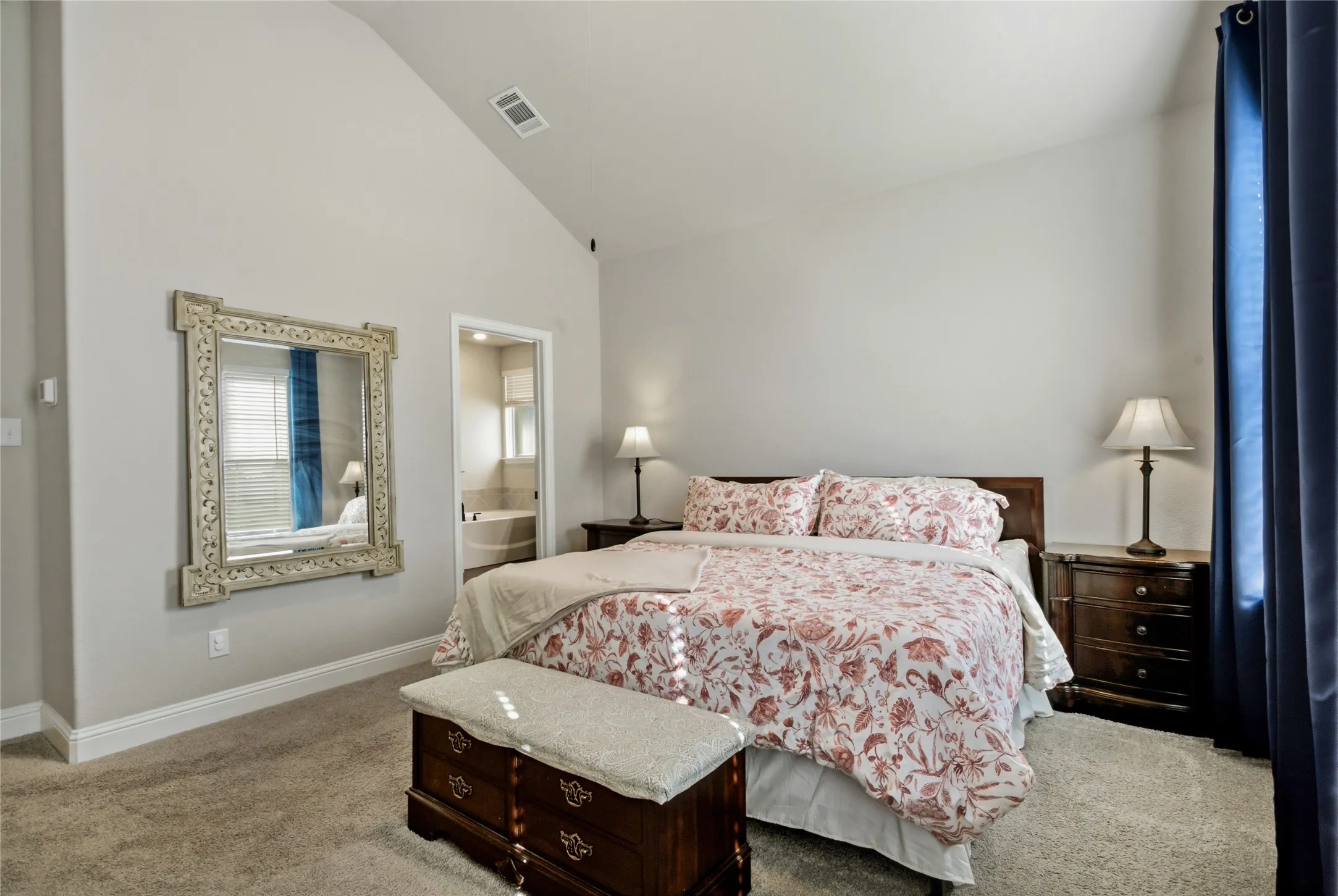 Spacious primary suite with room for a variety of furniture arrangements and relaxing retreat space.