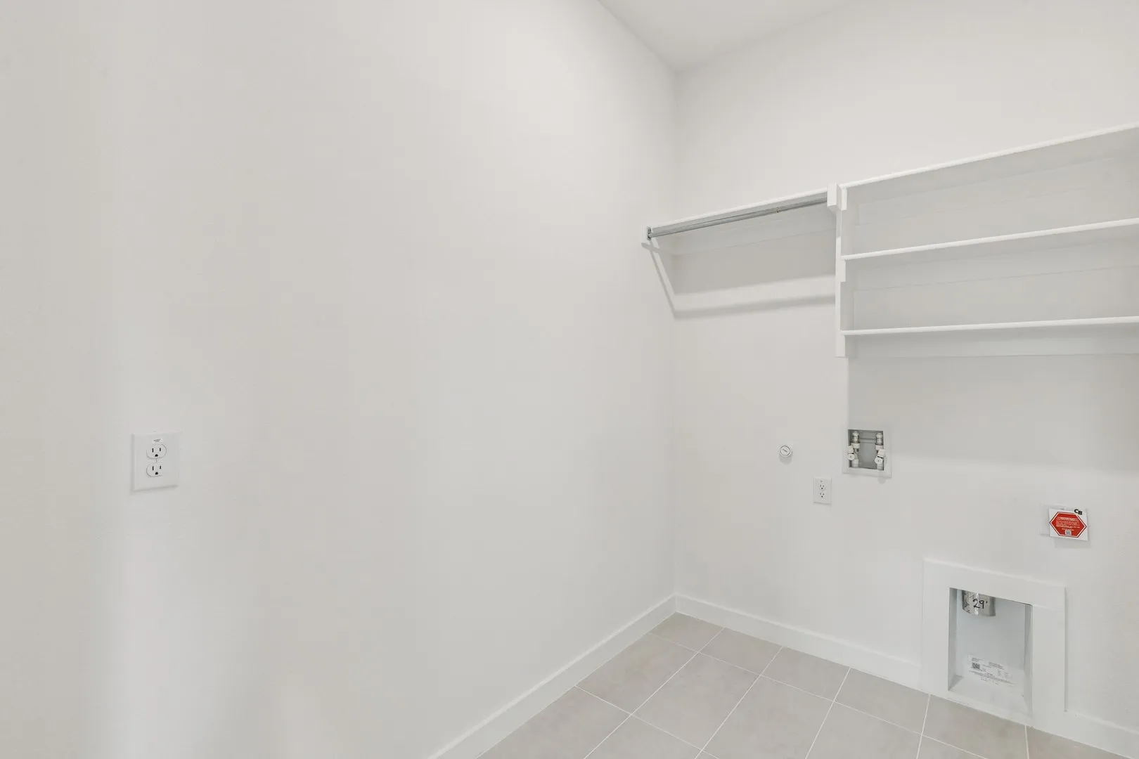 Utility Room in the Da Vinci II home plan by Trophy Signature Homes – REPRESENTATIVE PHOTO