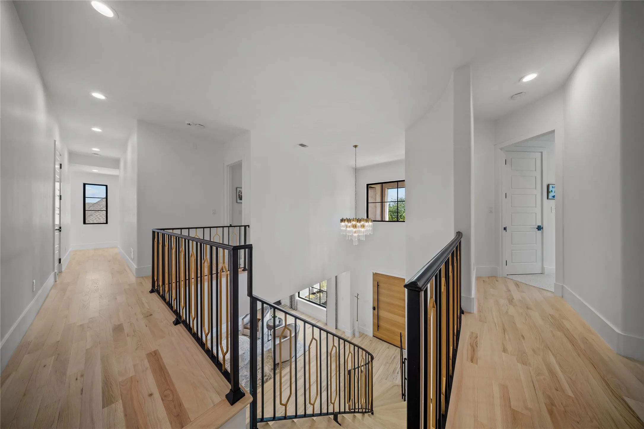 The home features two staircases with all-new custom railings.