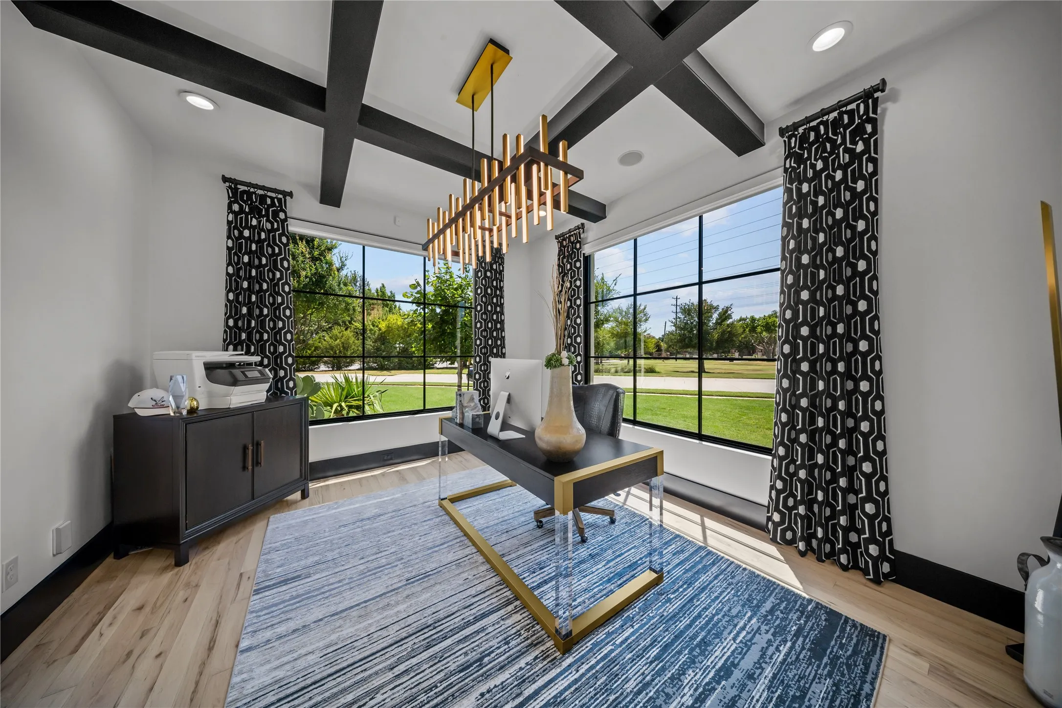 Your own corner office with custom ceilings, high-end lighting, and electric window shades.