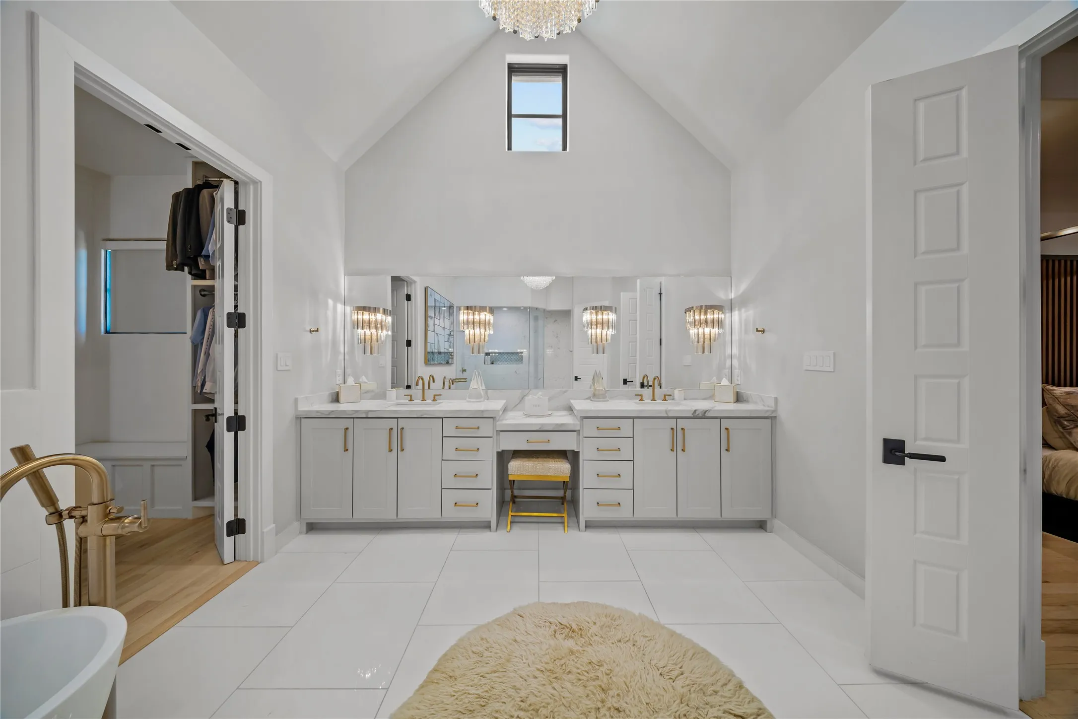 Master bath fully remodeled with a spa-like finish and decorative lighting.