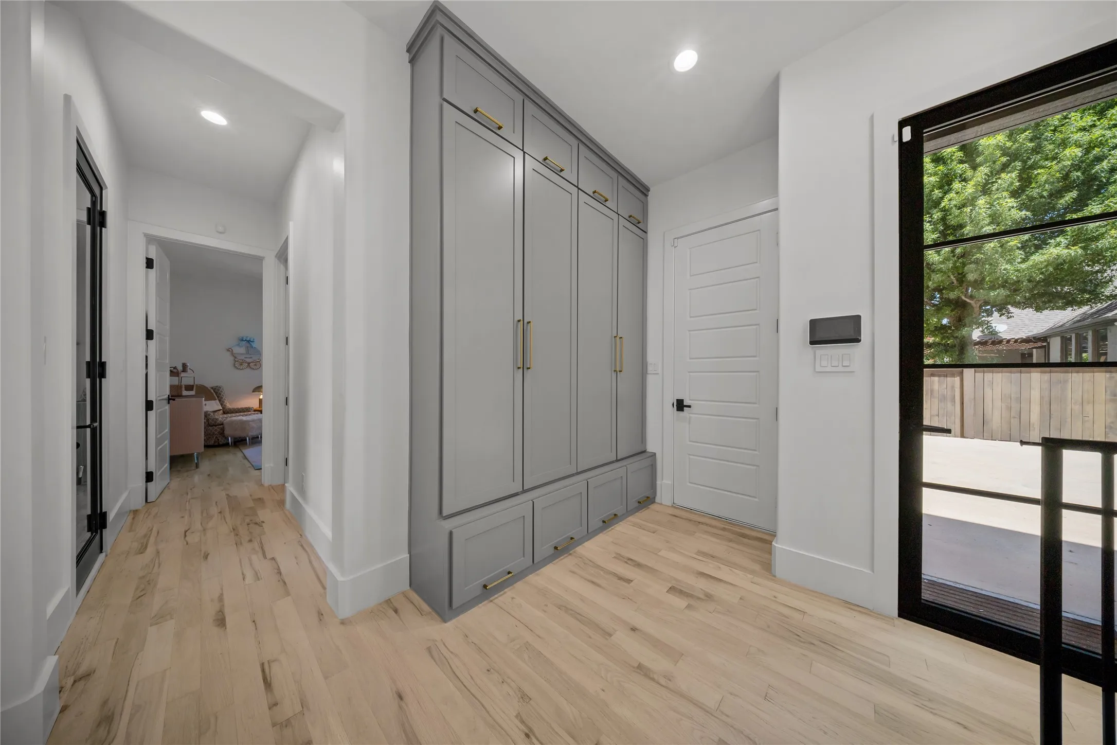4-car garage with convenient lockers for easy storage.