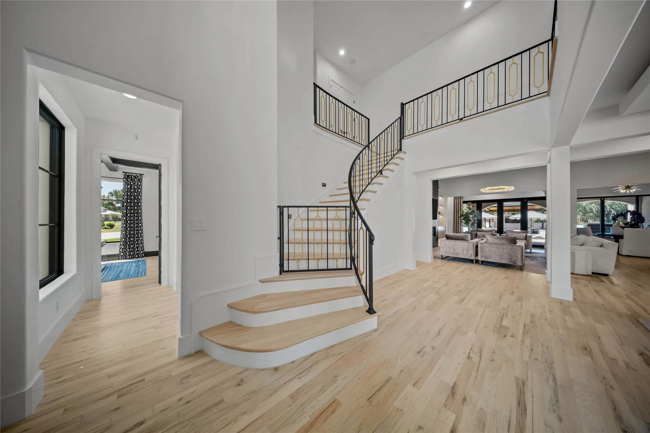 The entire home has modern hardwoods, Lutron smart-home system, all walls/ceilings have a Level 4 smooth finish for enhanced livability and security.