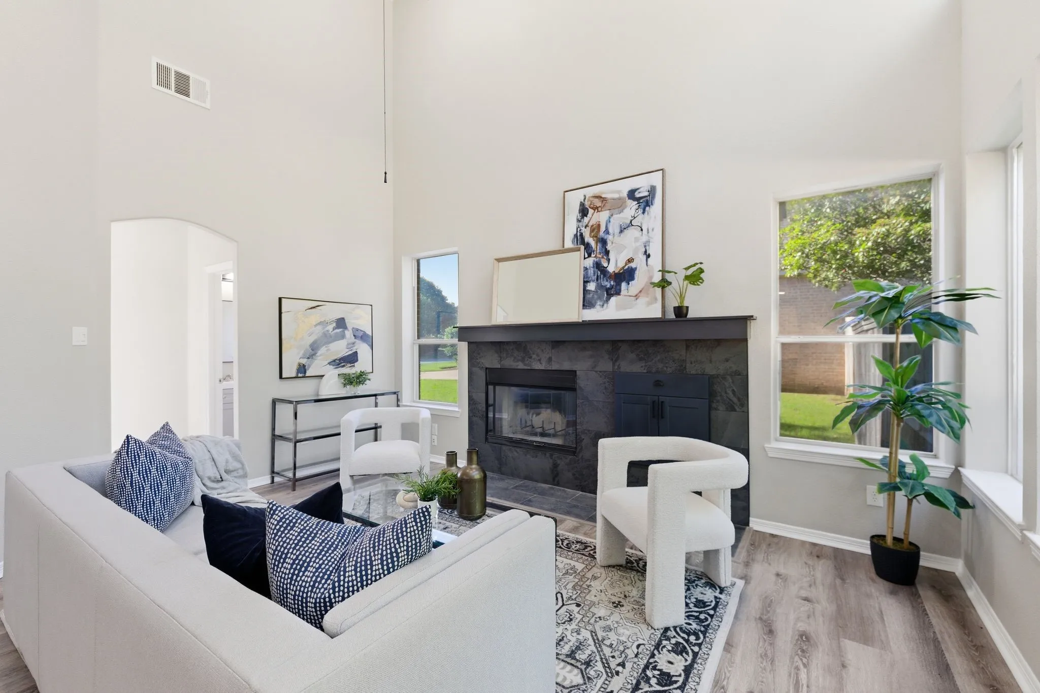 Vaulted ceilings soar above wood-finish flooring