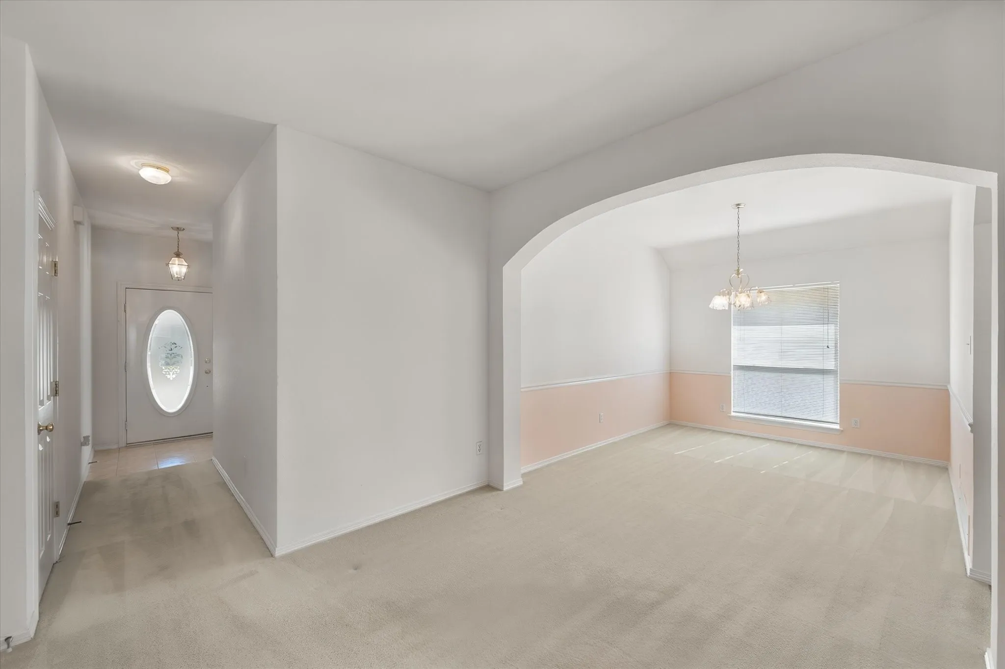 Front door and foyer seen from the living room
