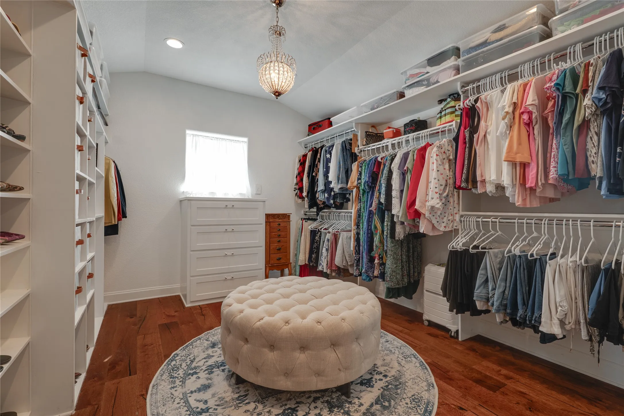 Primary closet with hidden access to safe room/tornado shelter