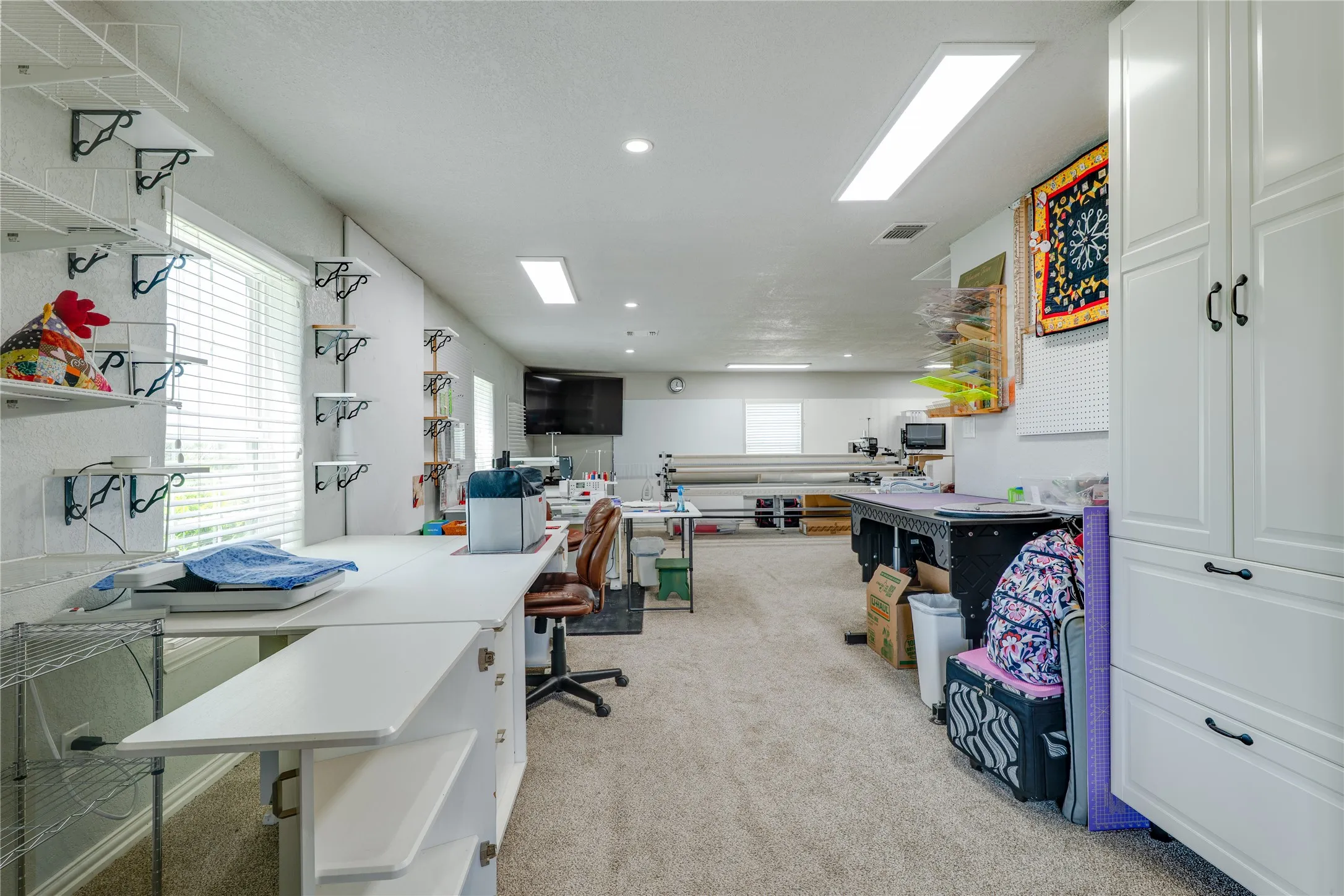 Living area in Guest House (currently used as a hobby space)