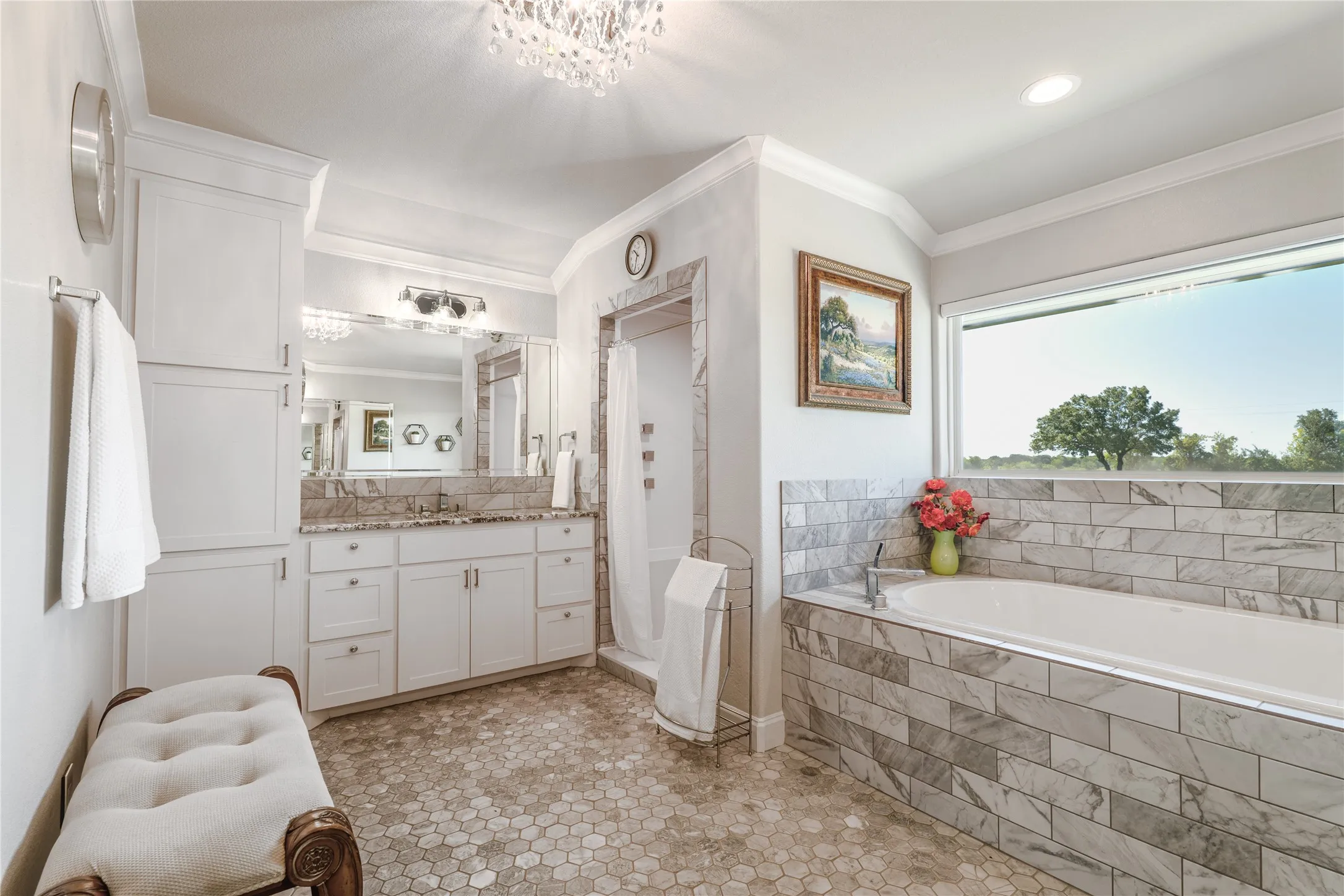 Separate vanities, tub, and shower