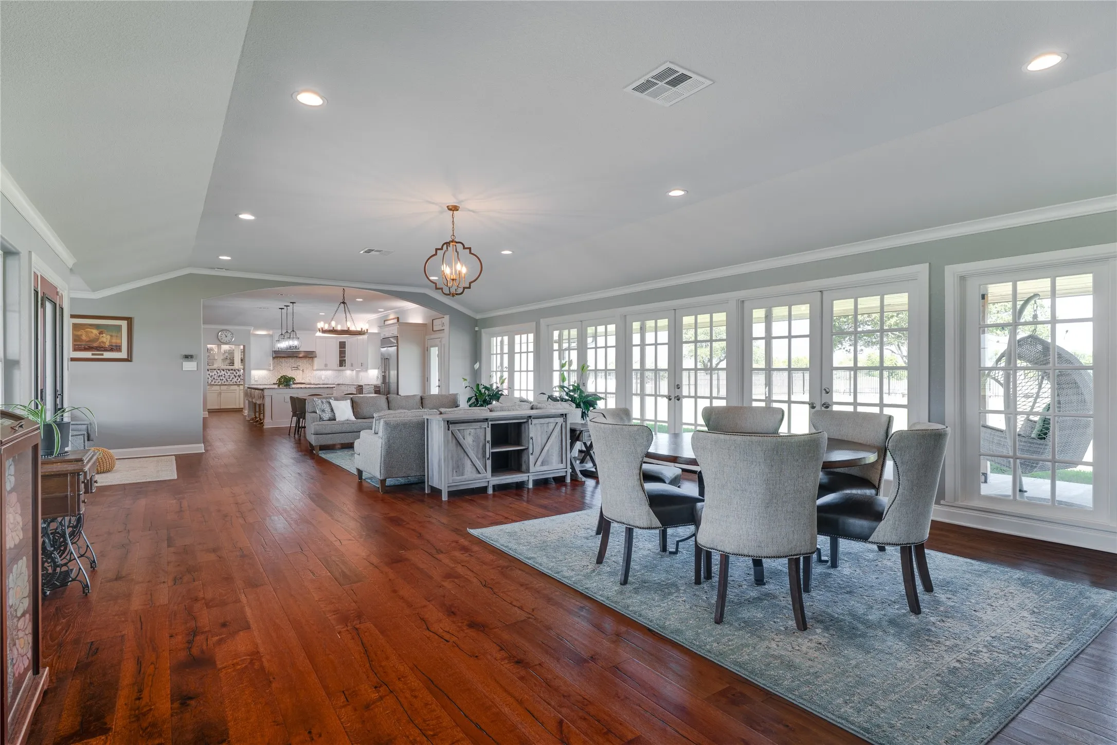Hardwood flooring throughout the kitchen, living area and dining area