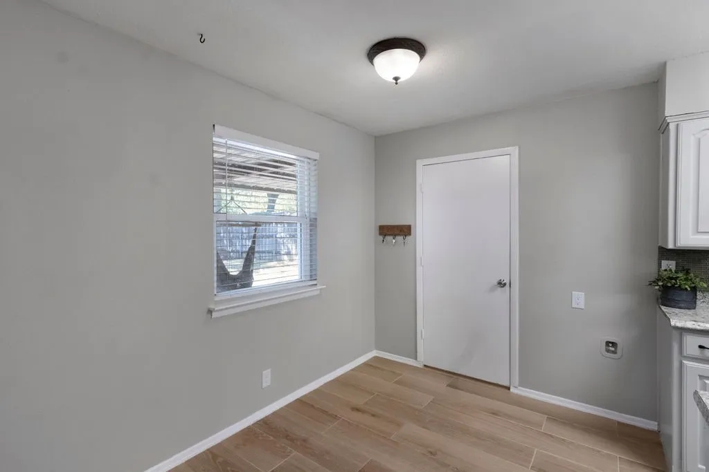 Eat-in area.  Door to laundry room.