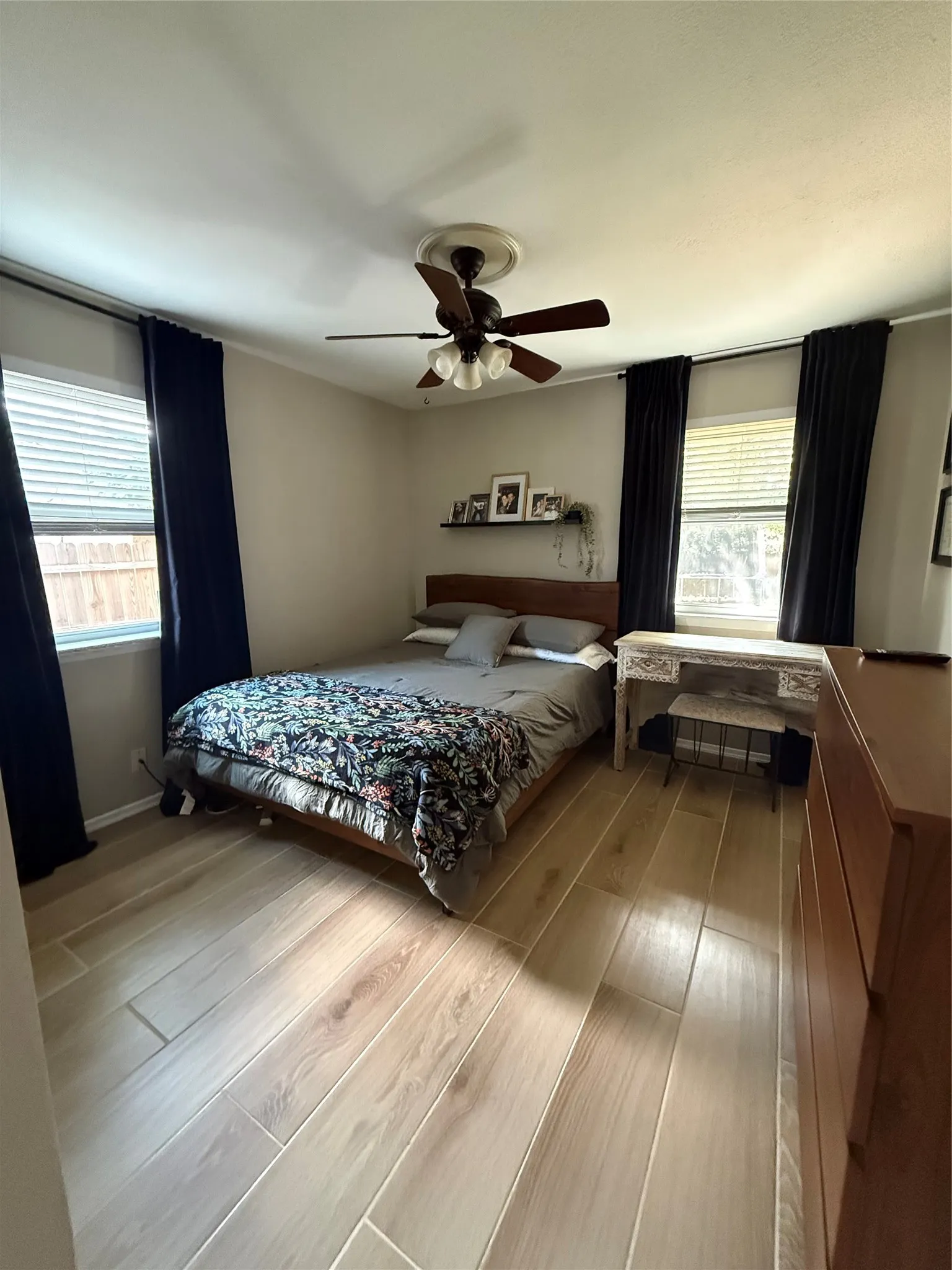 Primary bedroom with sellers furniture.