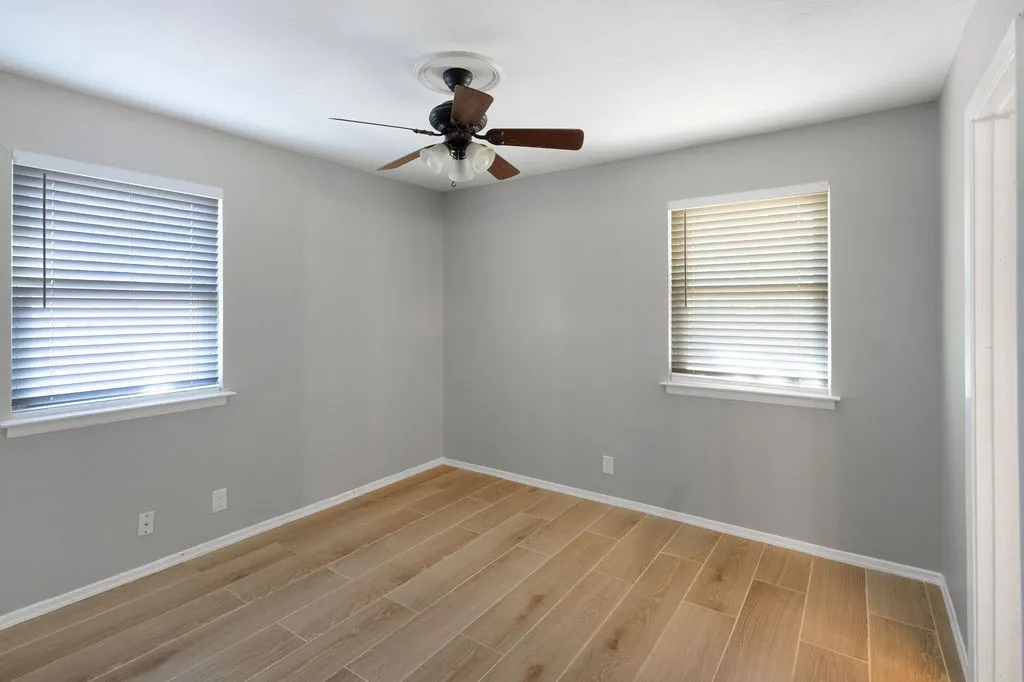 Nice size primary bedroom from hallway door.