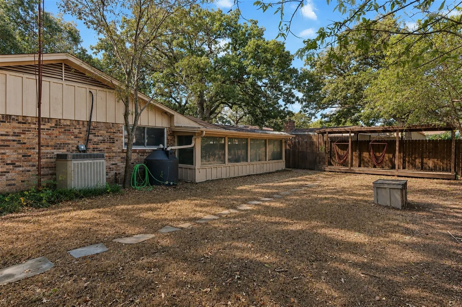 Huge backyard with deck and storage
