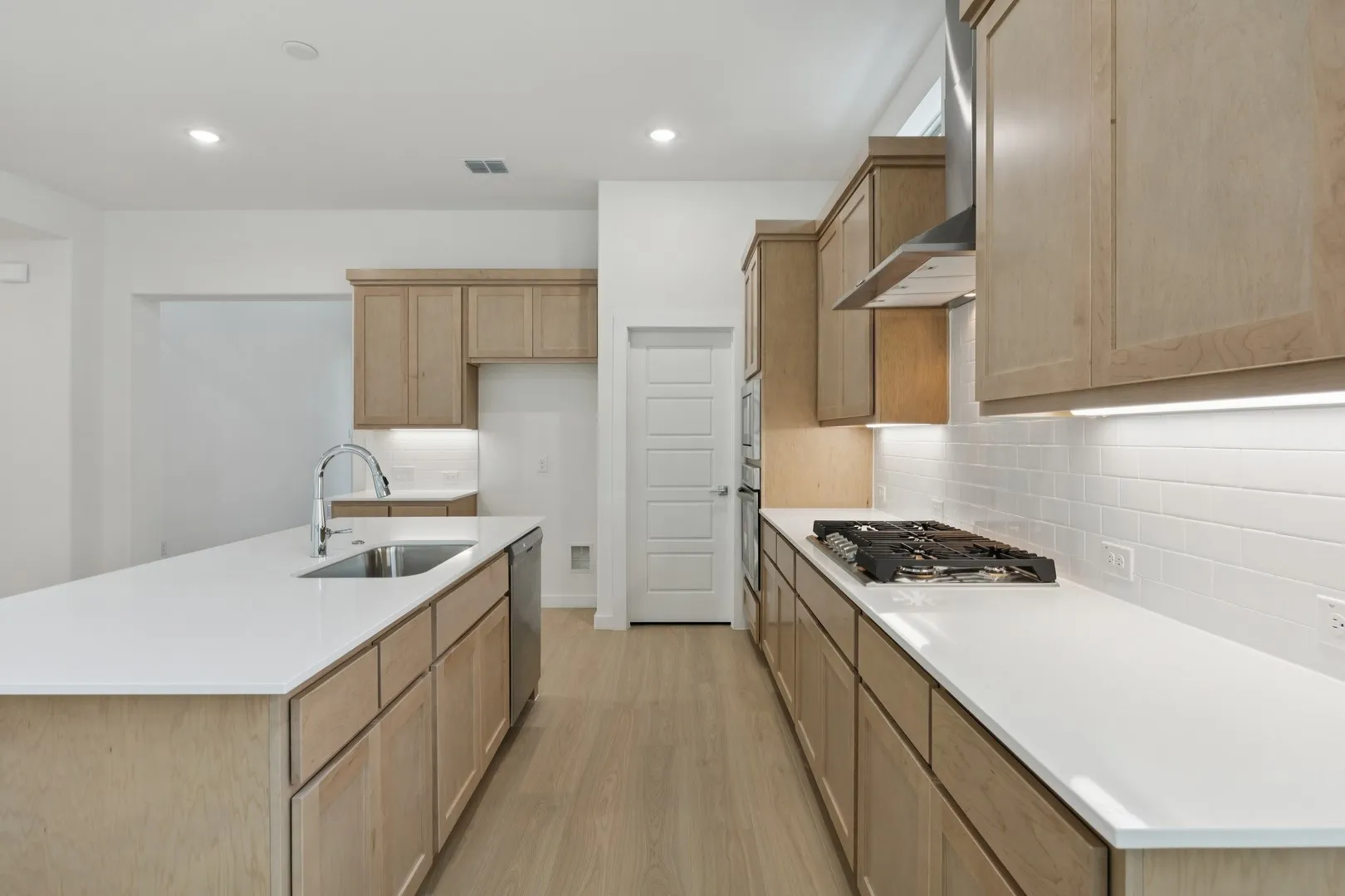 Kitchen in the Monet II home plan by Trophy Signature Homes – REPRESENTATIVE PHOTO