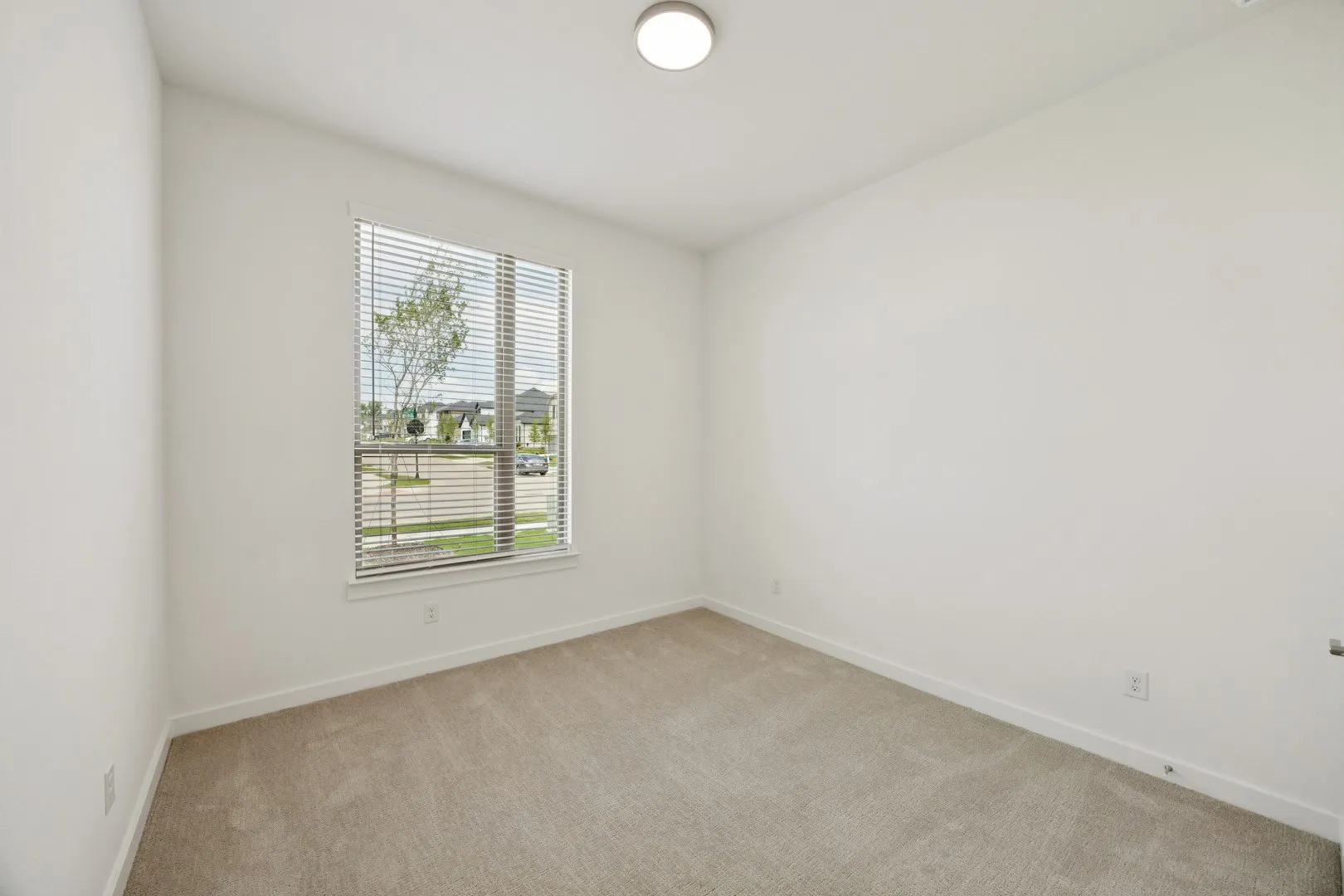 Bedroom in the Monet II home plan by Trophy Signature Homes – REPRESENTATIVE PHOTO