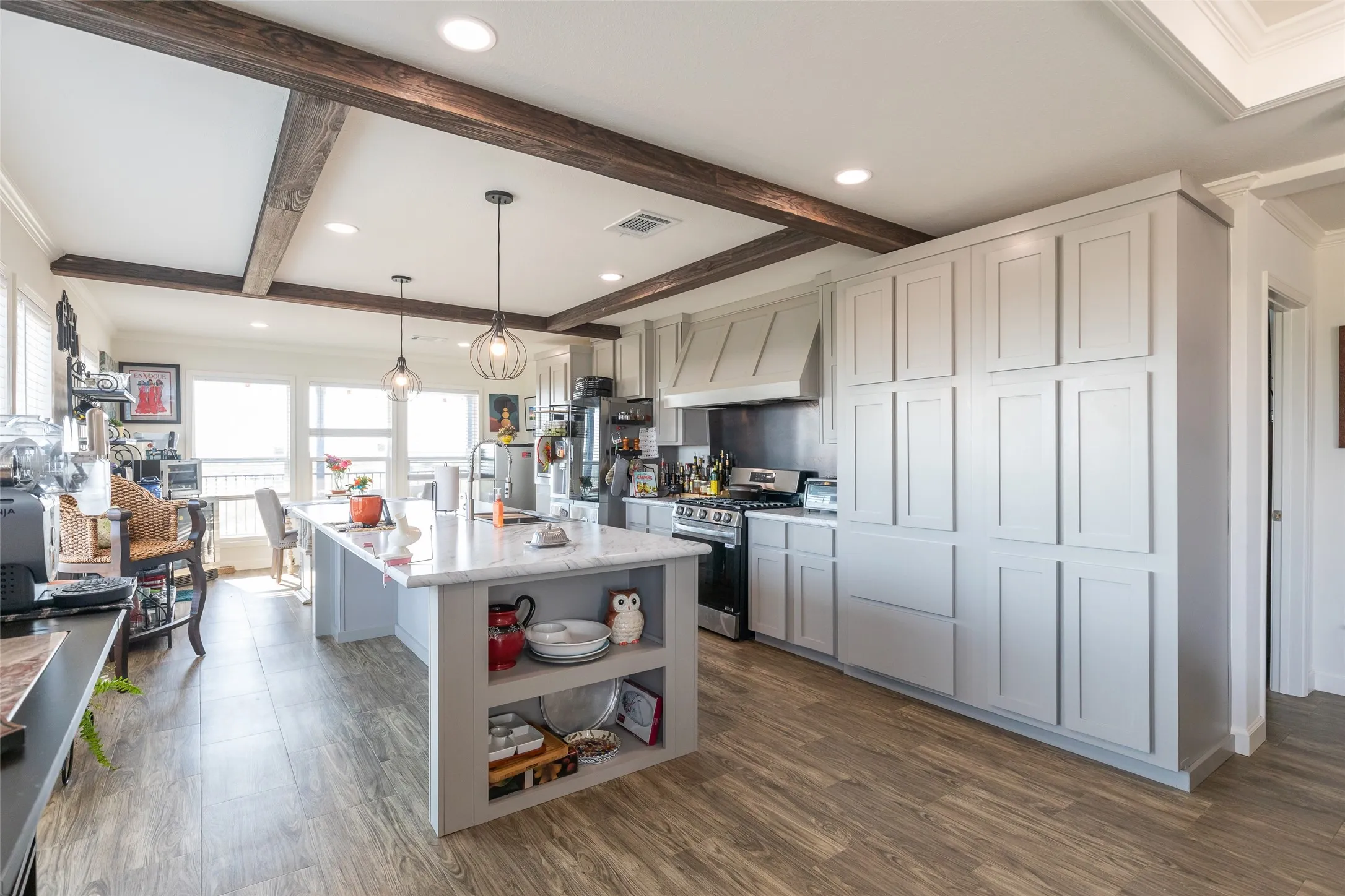 Lots of built in cabinets and space! Look at that Kitchen Island!