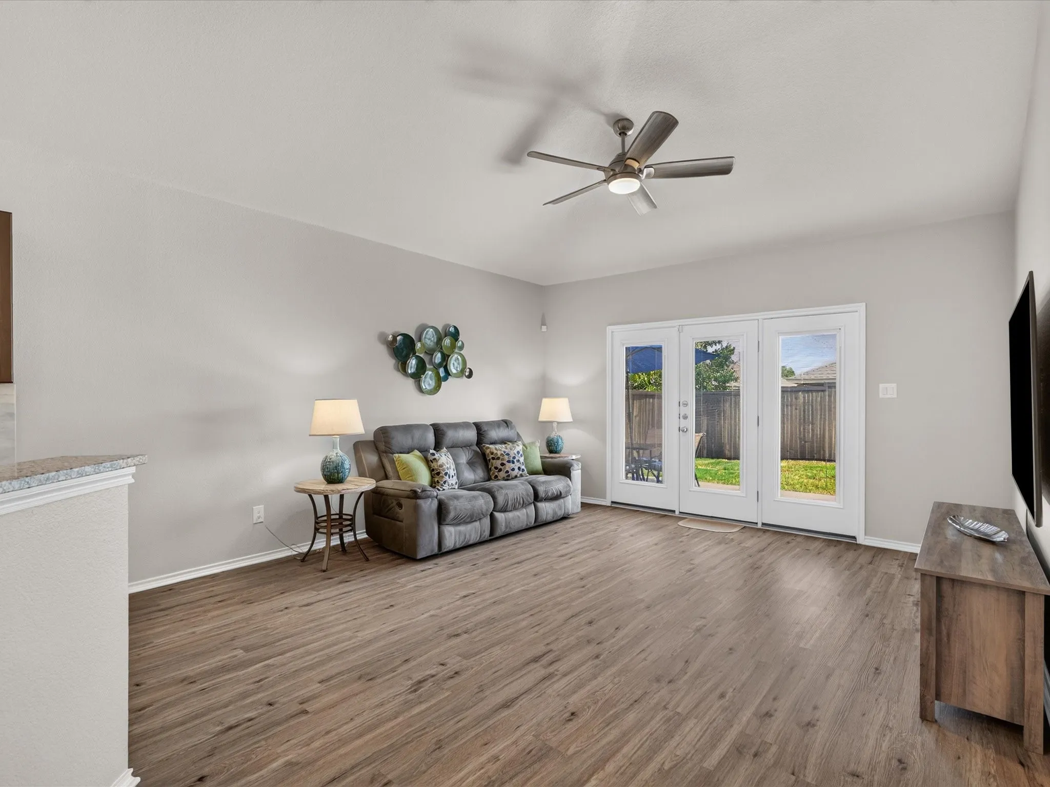 SPACIOUS FAMILY ROOM RIGHT OFF THE KITCHEN WITH SOARING CEILLINGS