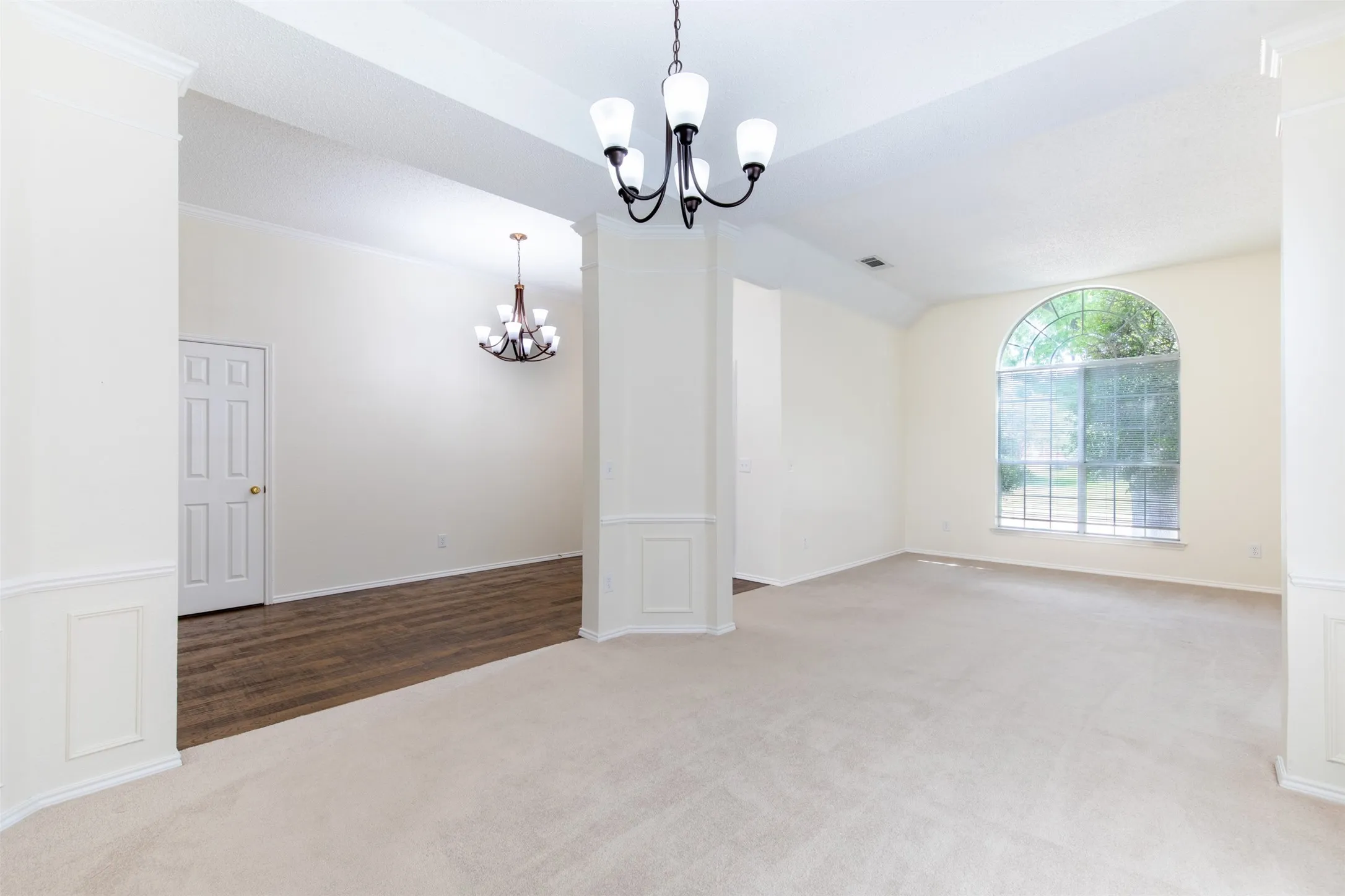 Dining room flows effortlessly to living room and foyer.