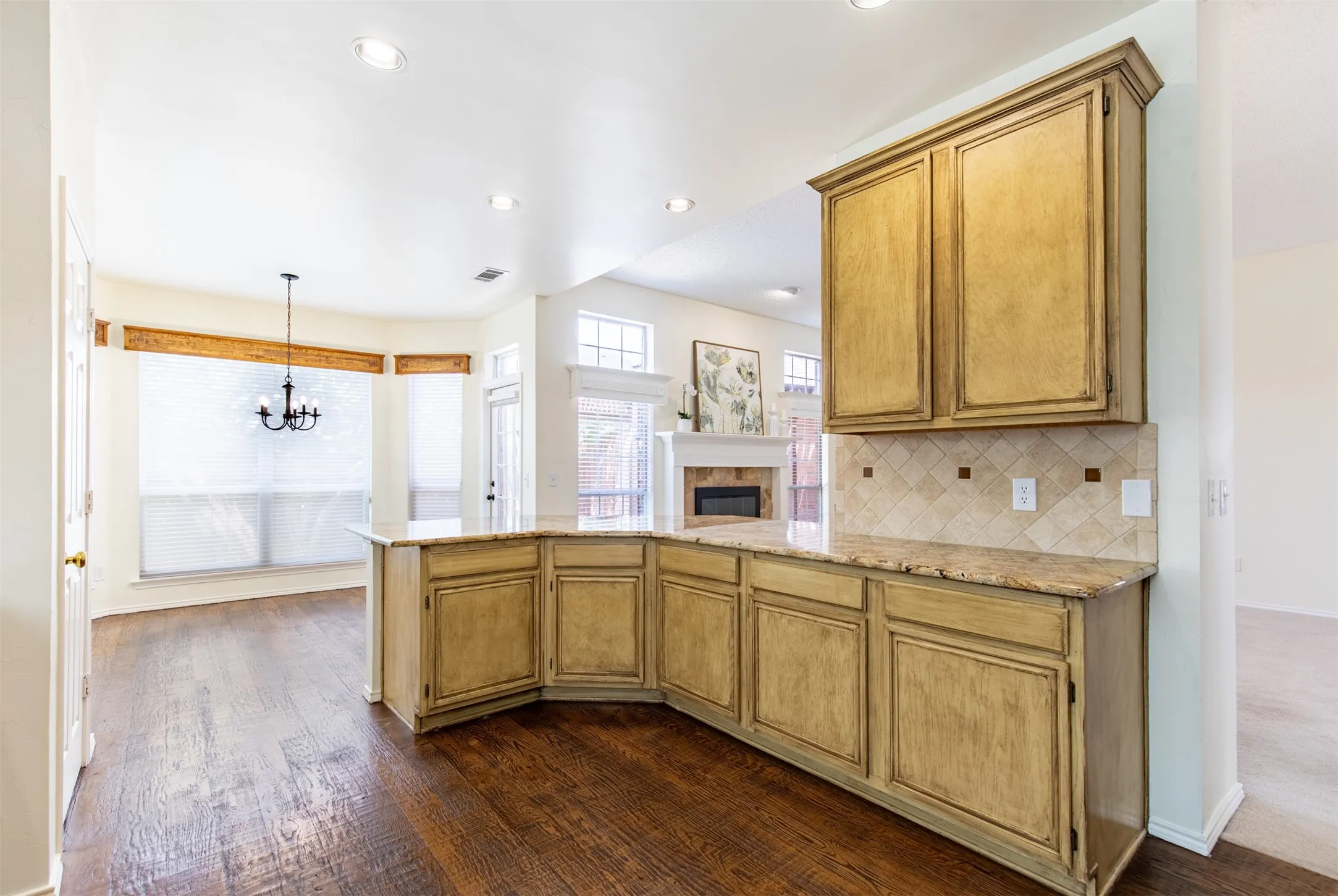 Kitchen flows nicely to breakfast room.
