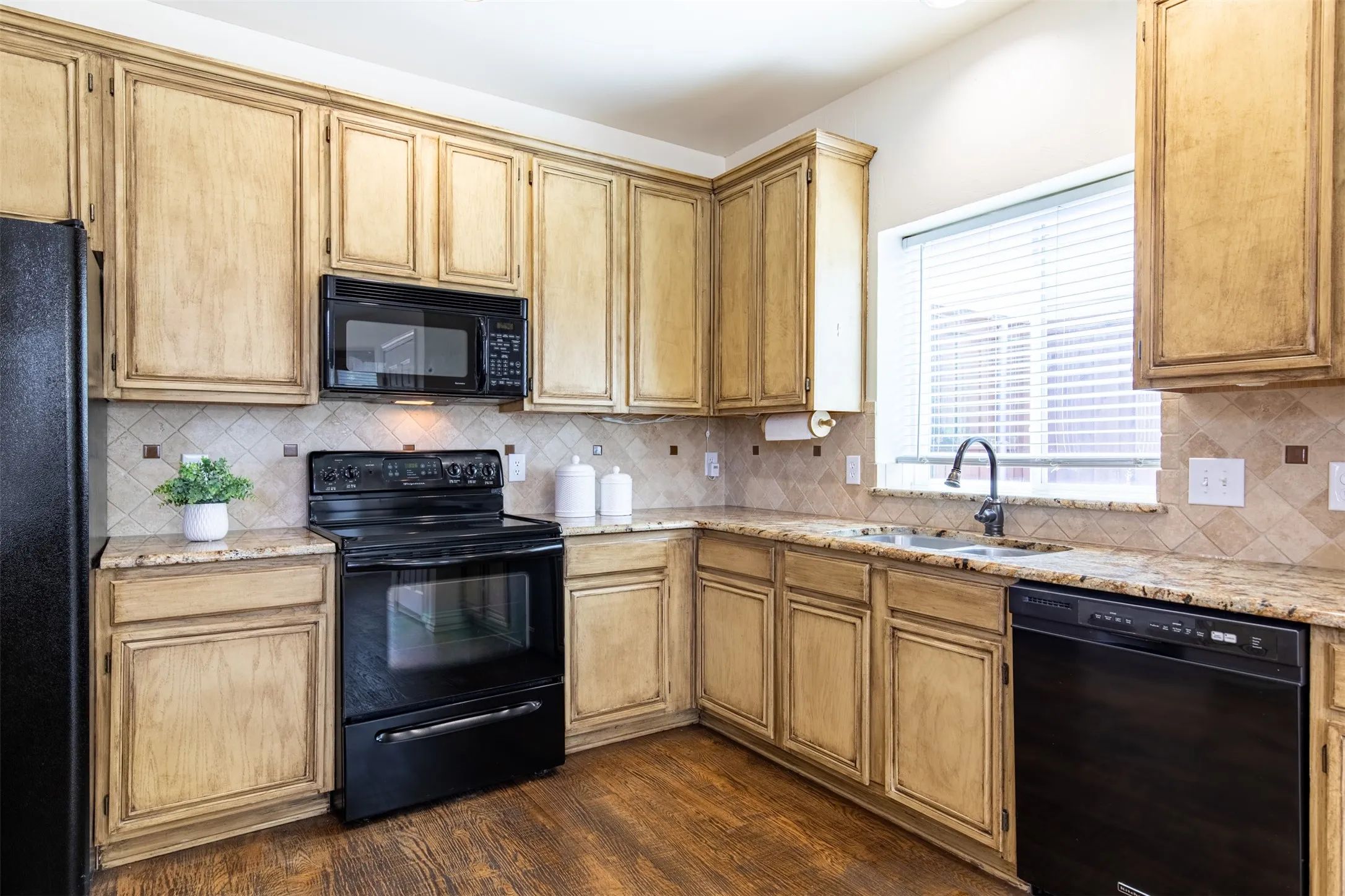 Kitchen with double sink and natural light.