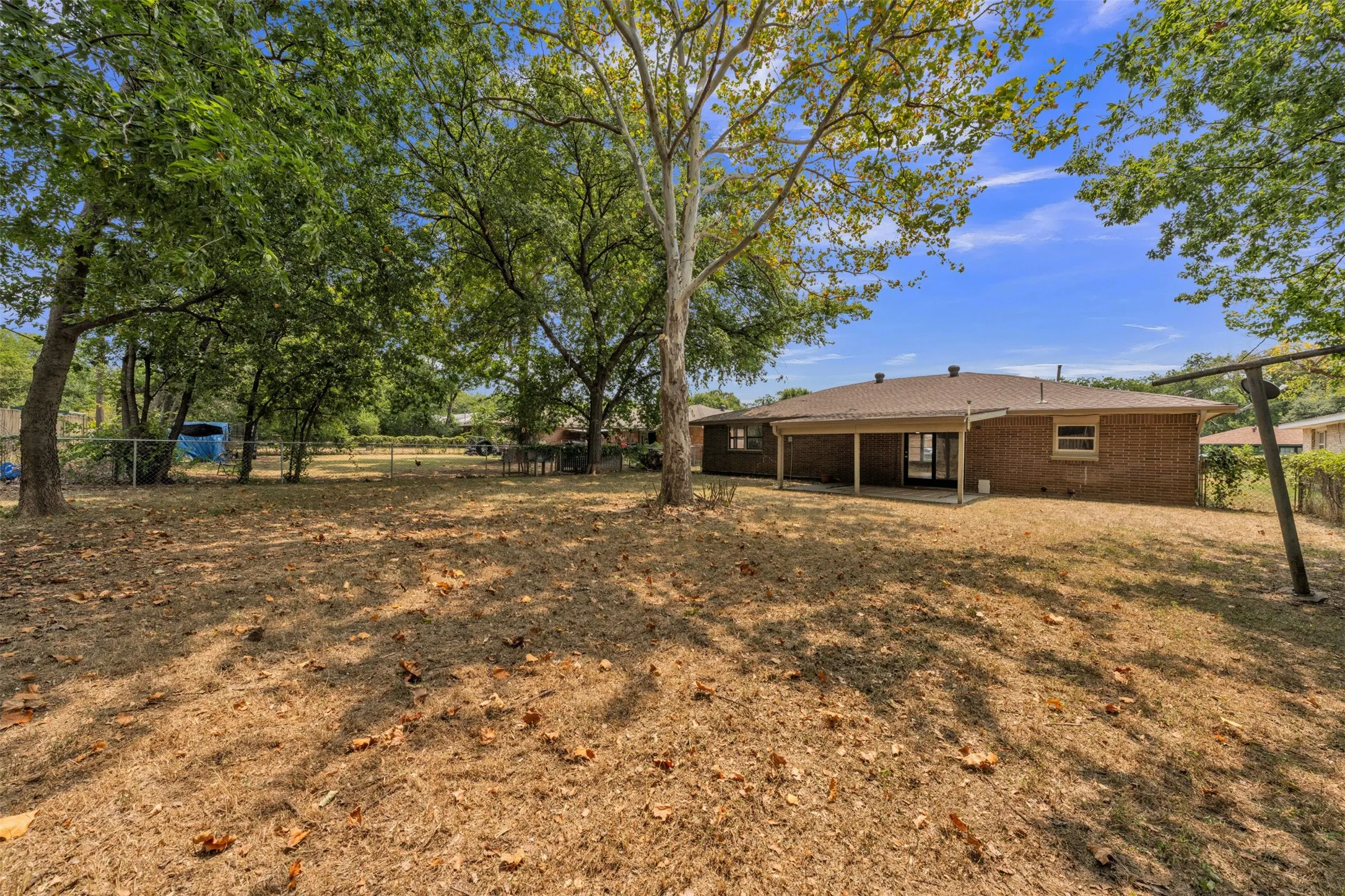 Large backyard with mature trees!