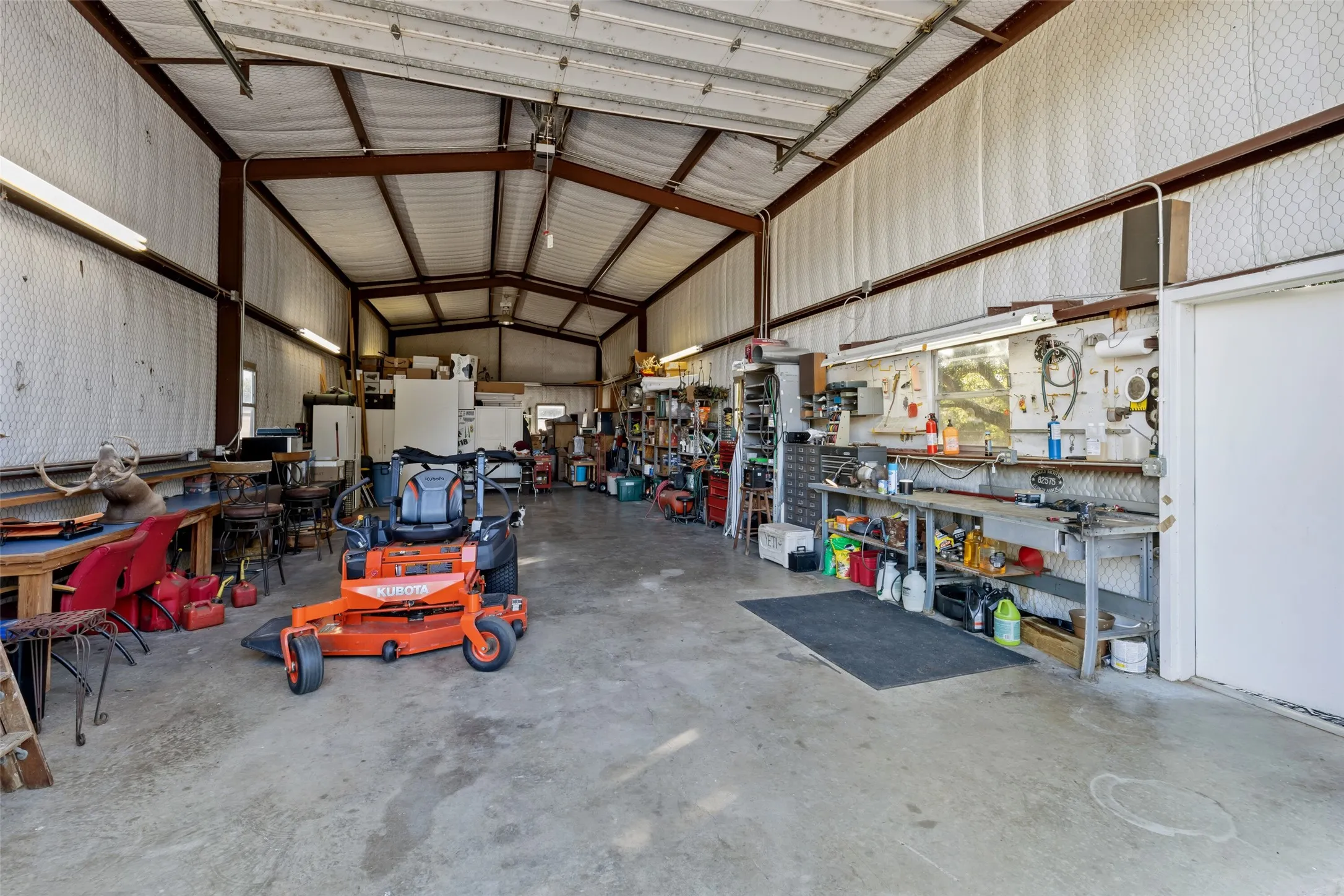Back House RV tall shop with RV connections inside.