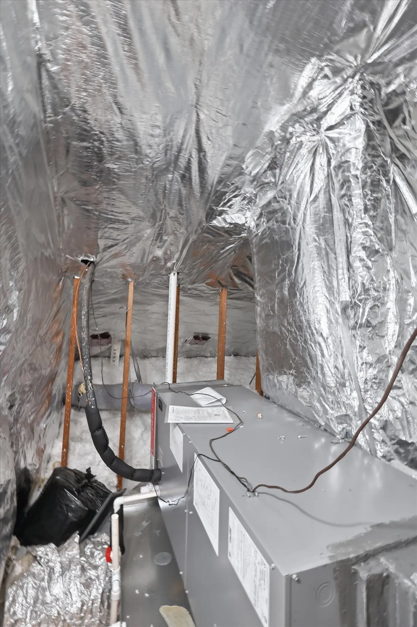 The entire attic has spray foam insulation and a radiant barrier.