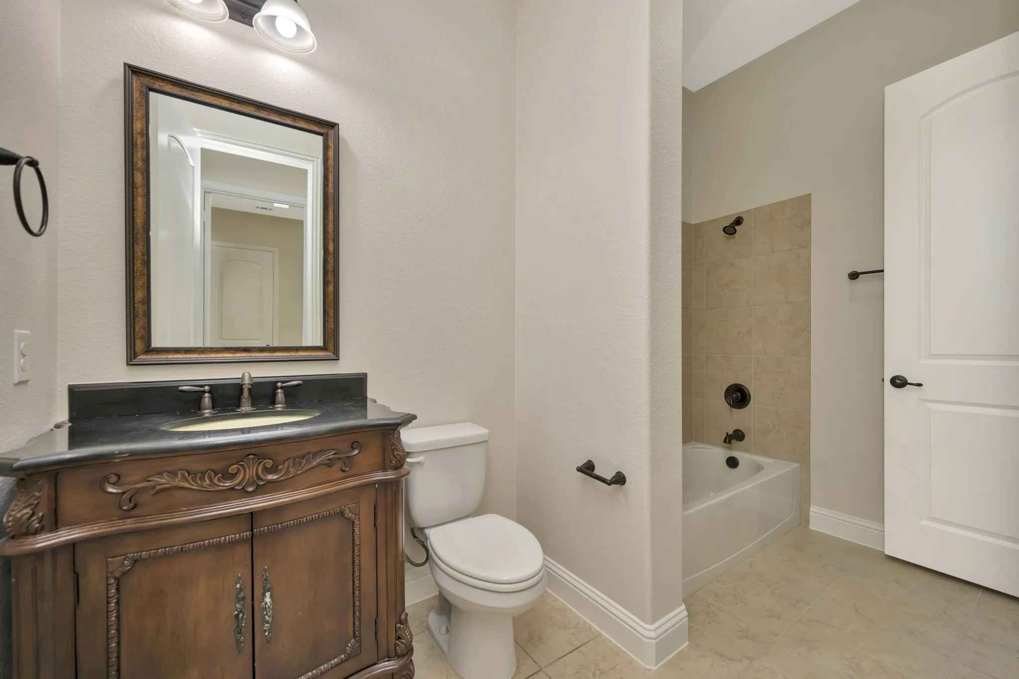 Full Bath 2 is on the first floor and is ensuite to Bedroom 2