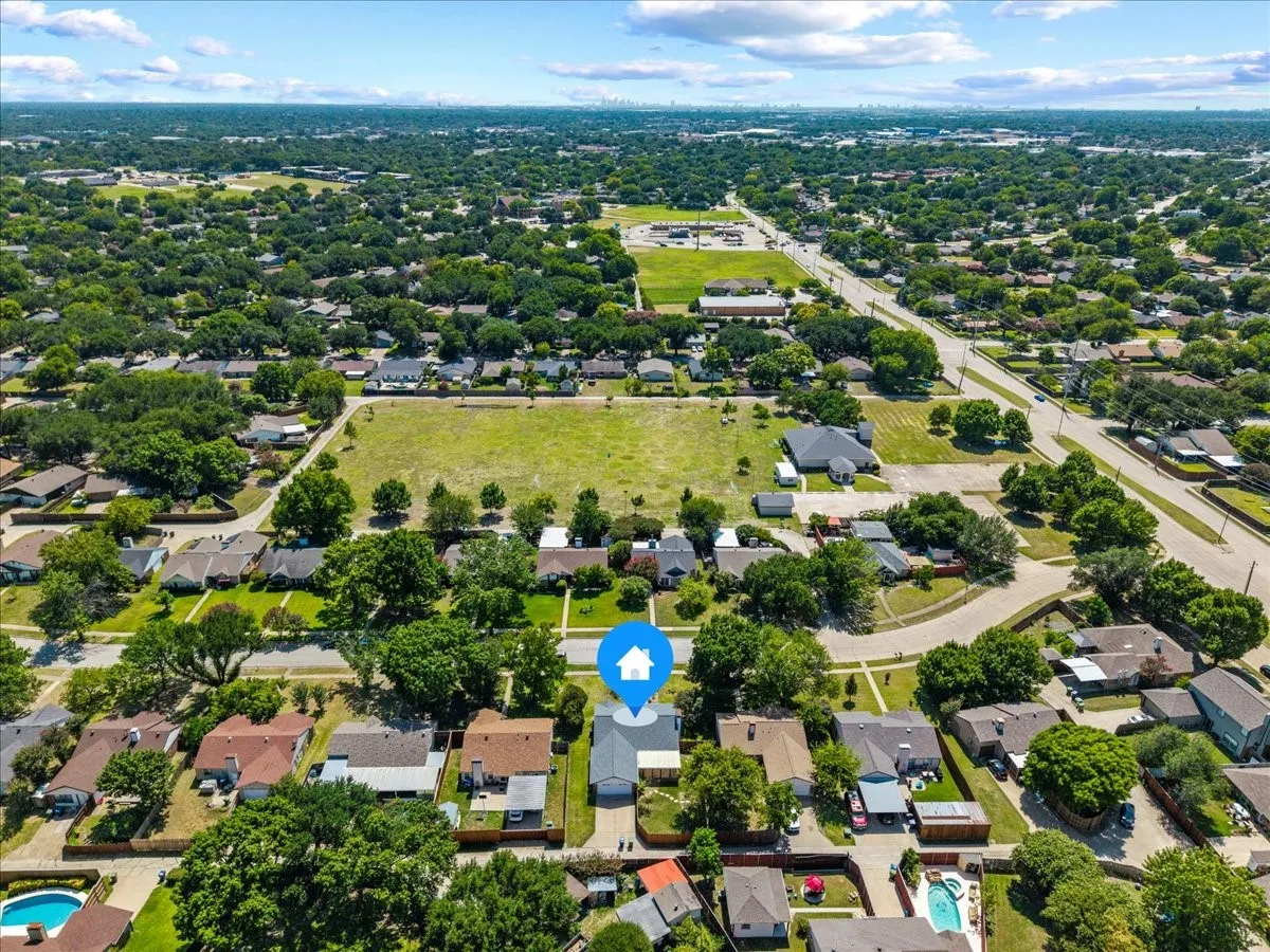 Aerial view of the surrounding neighborhood.