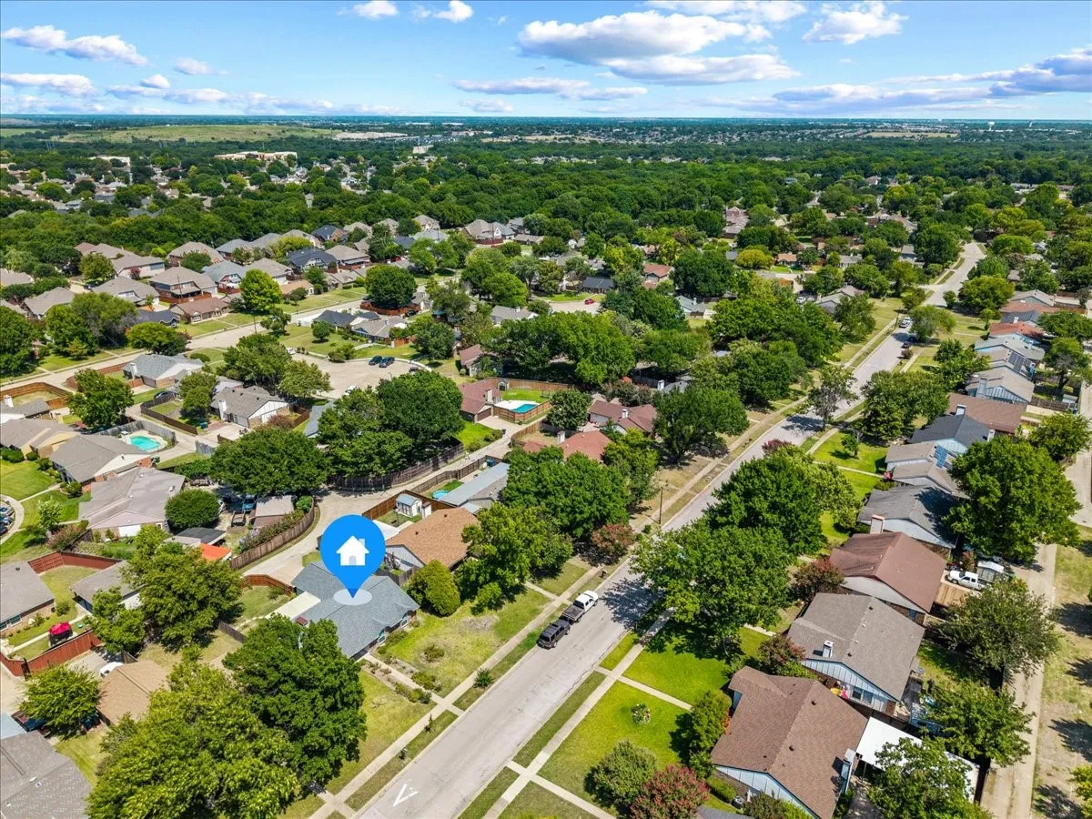 Aerial view of the surrounding neighborhood.