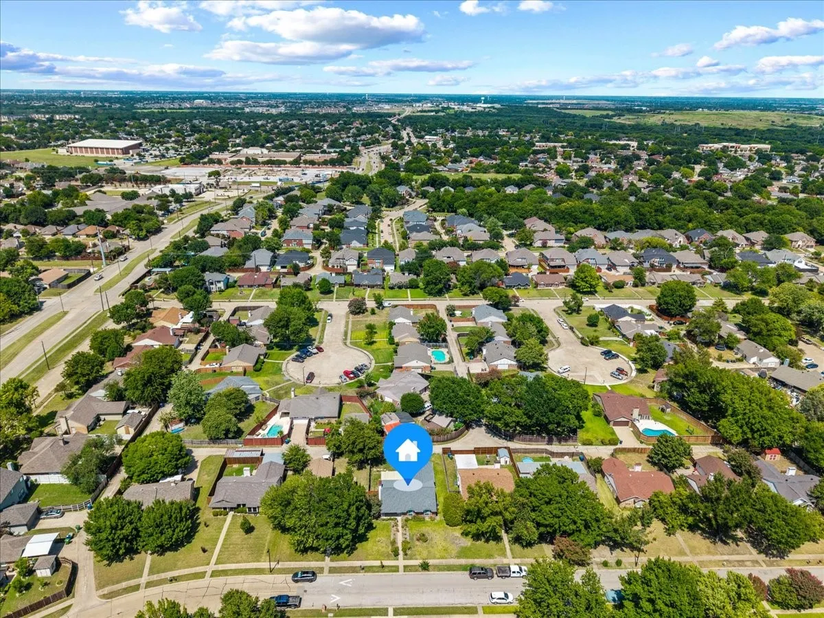 Aerial view of the surrounding neighborhood.