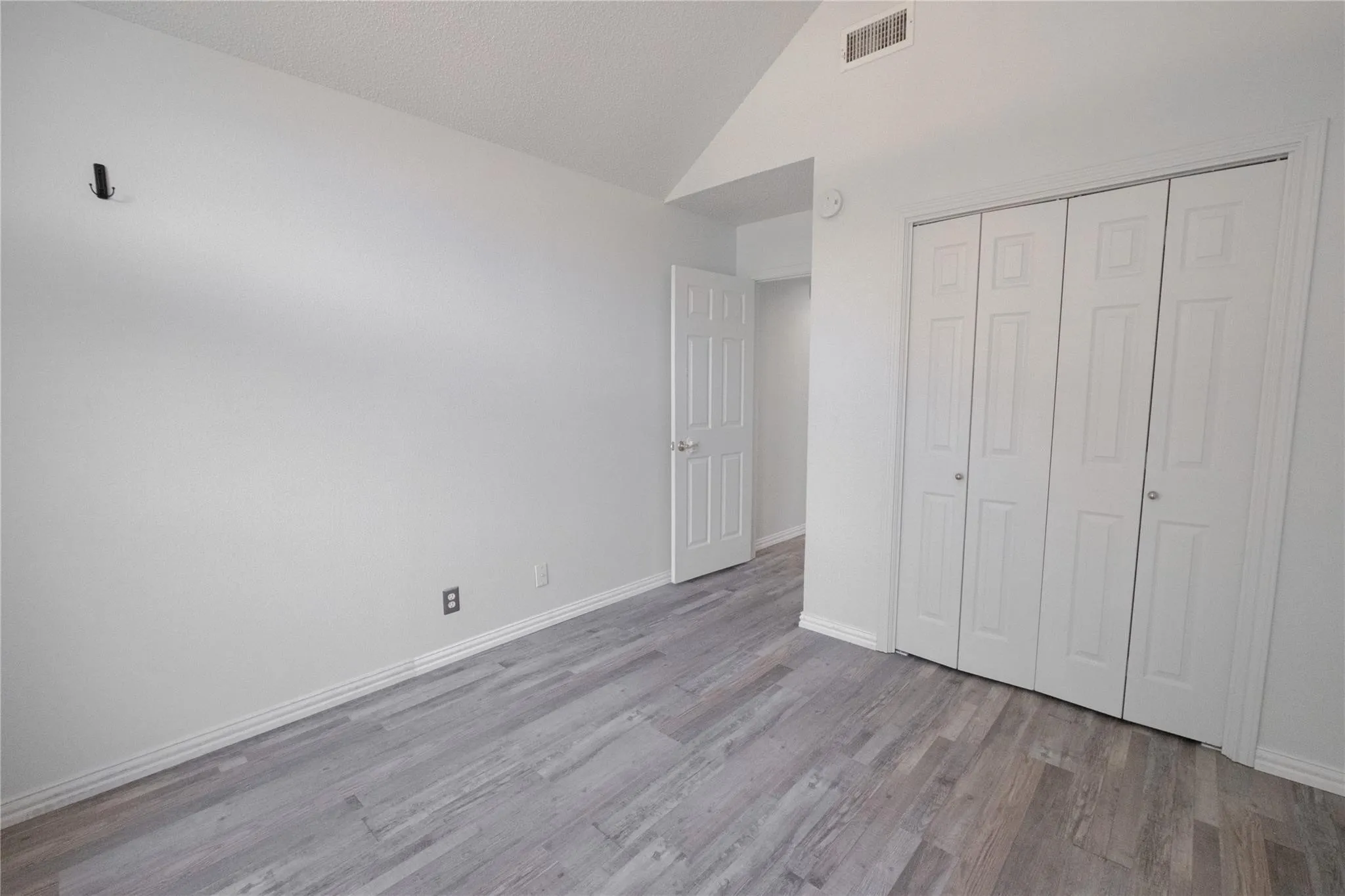 Vaulted ceiling with an overhead vent