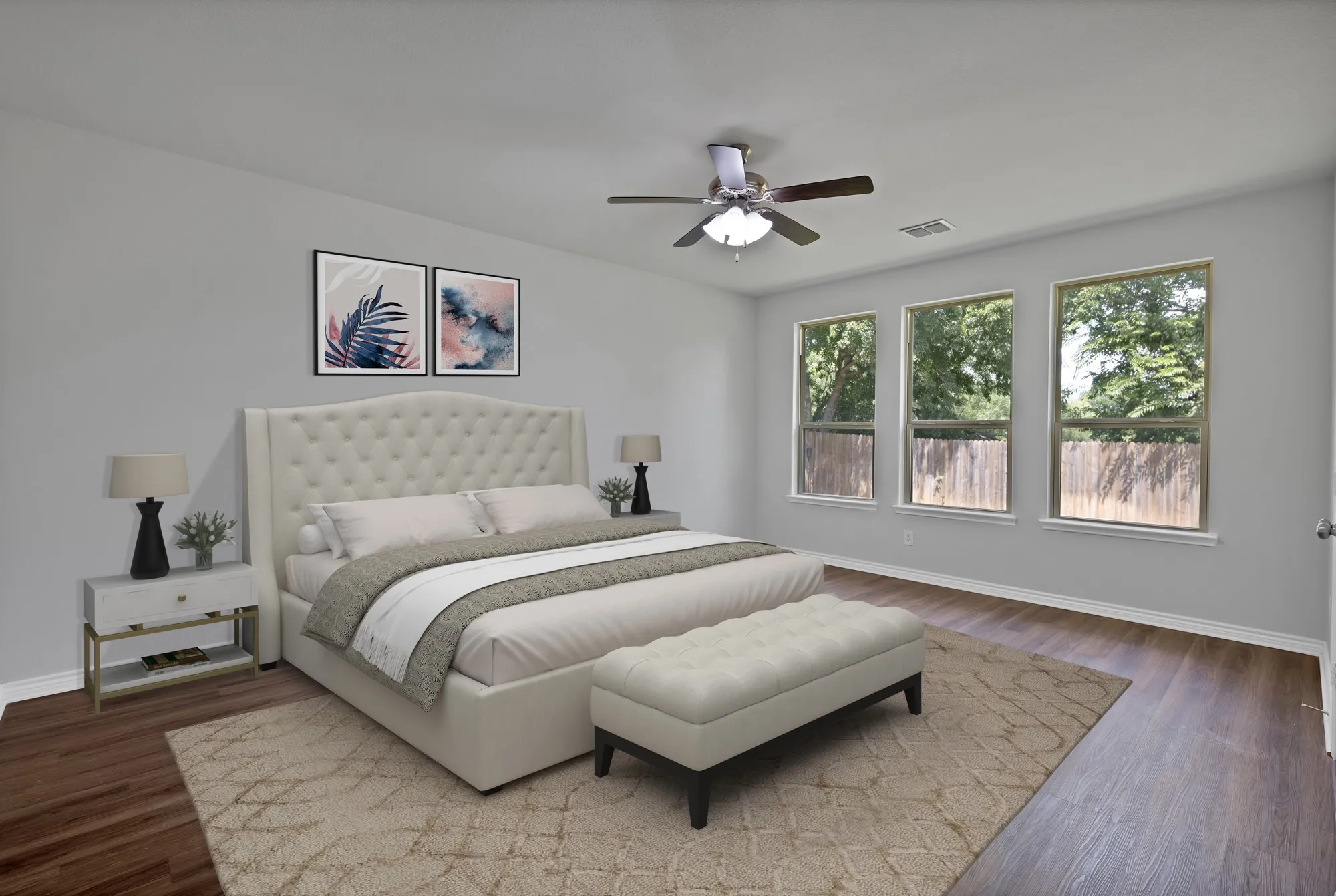 Bedroom featuring wood finished floors and ceiling fan