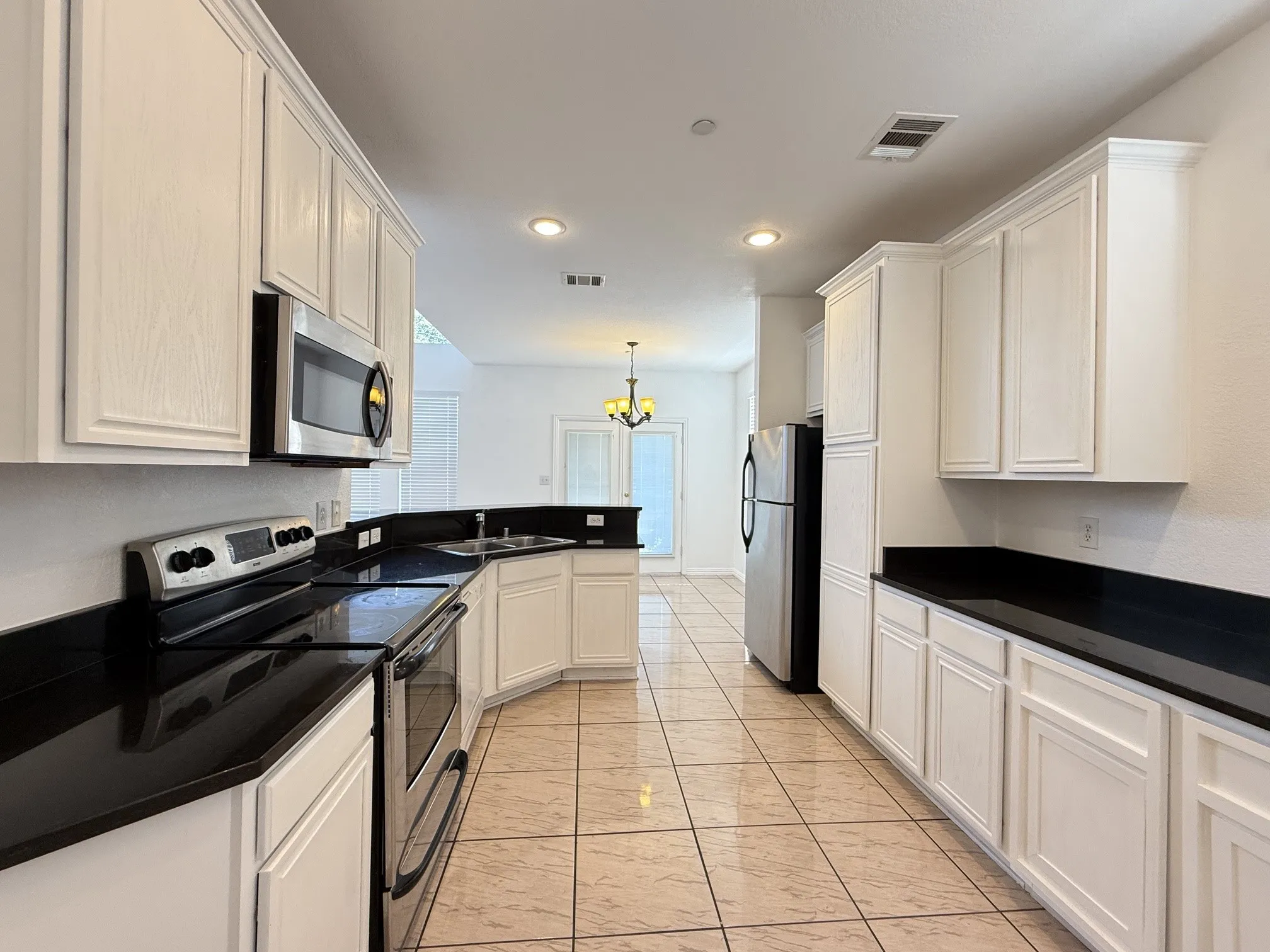Kitchen with plenty of cabinets & counter space