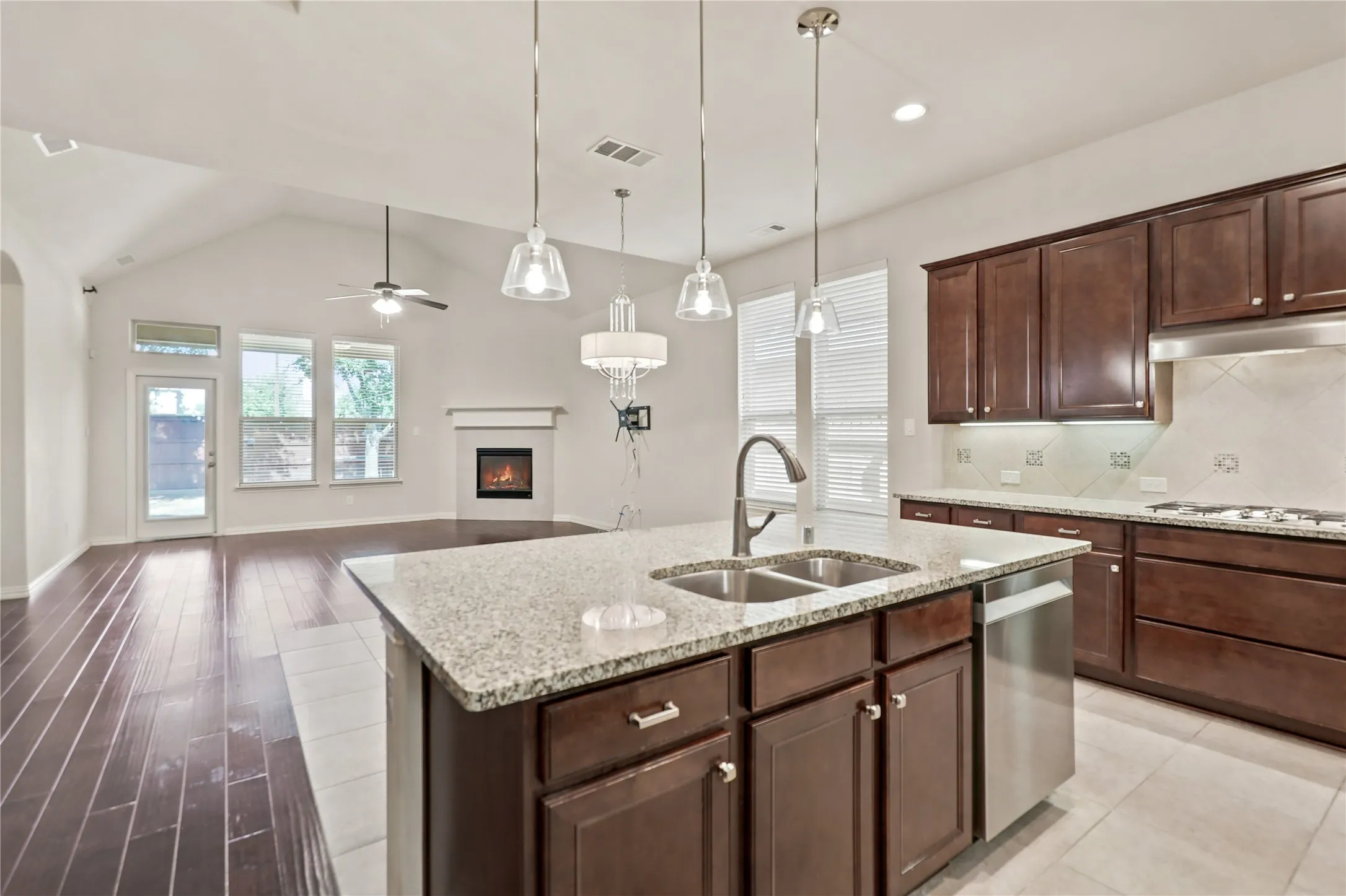 Kitchen island with granite countertop and dual basin sink