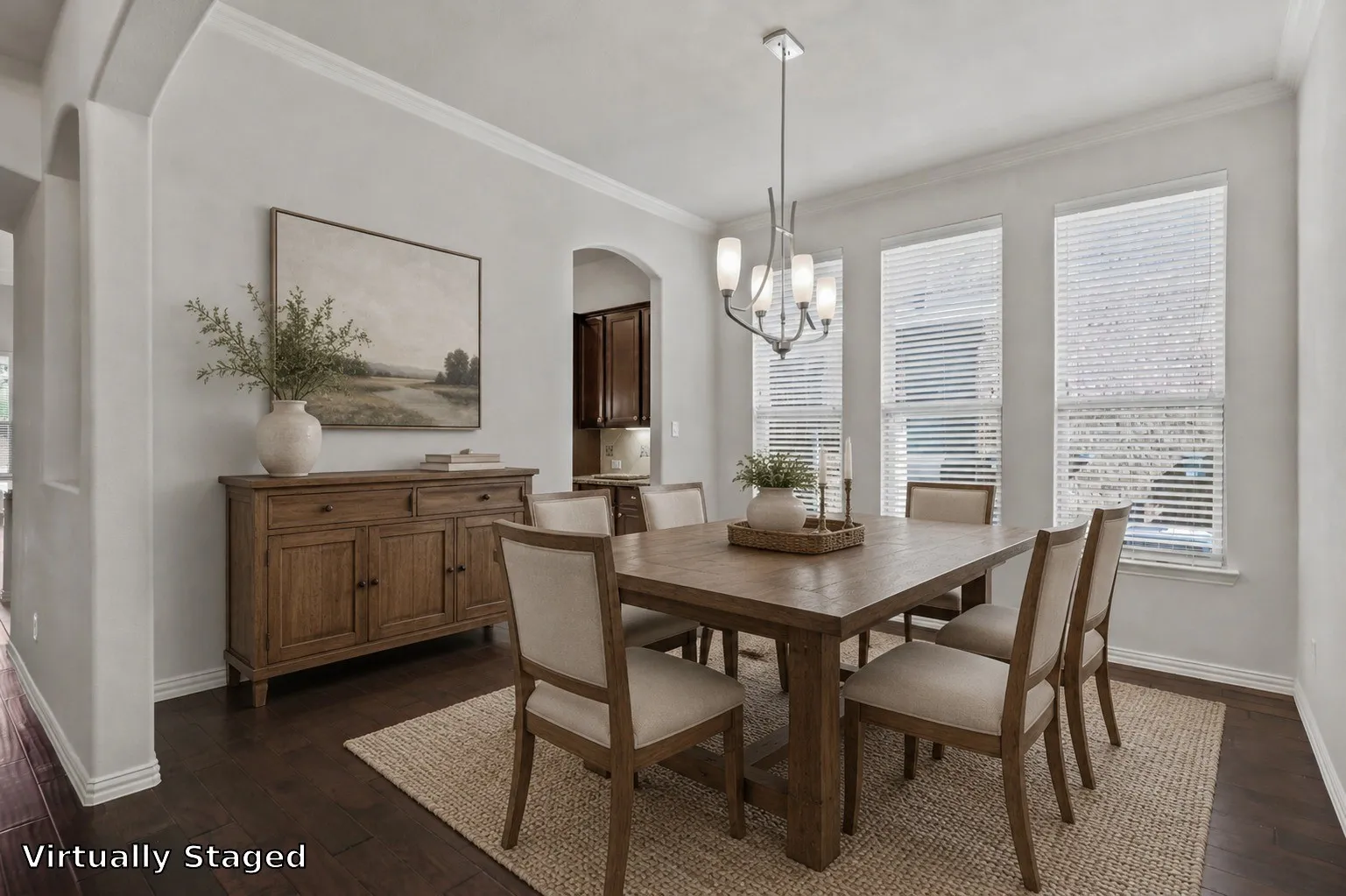 Recessed lighting, wood-finish flooring, and multiple window installations