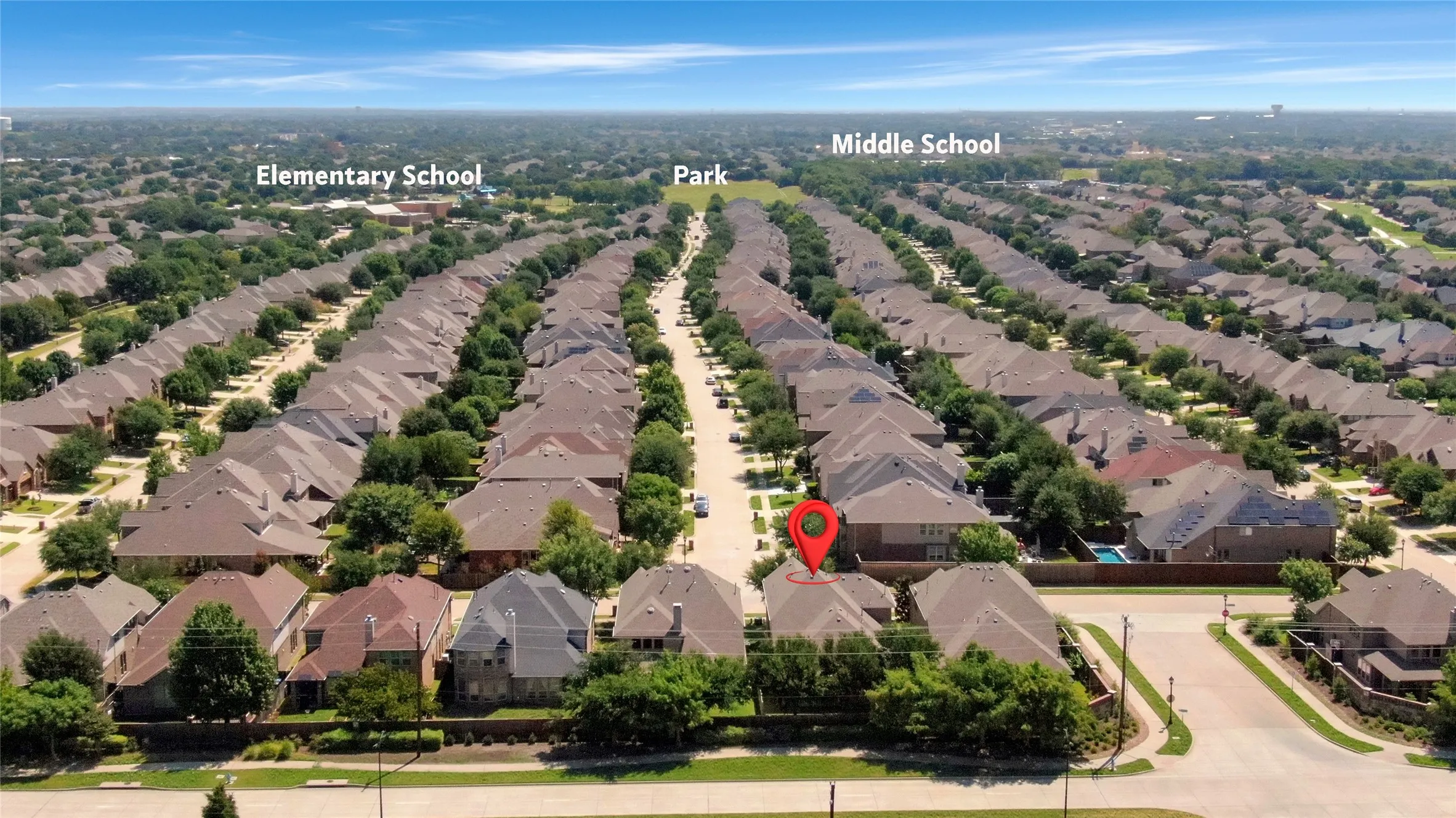 Residential area with a park, elementary school, and middle school