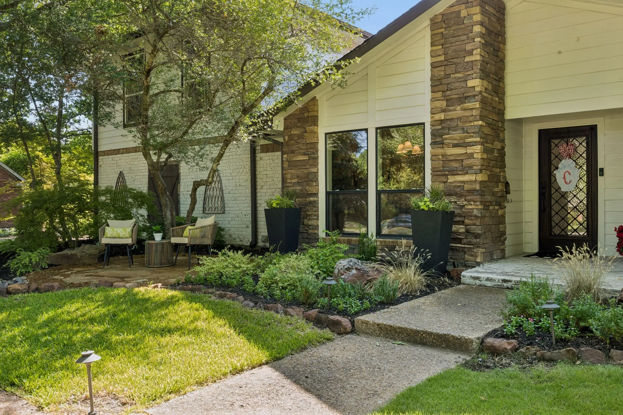 Professional landscaping and stacked stone details