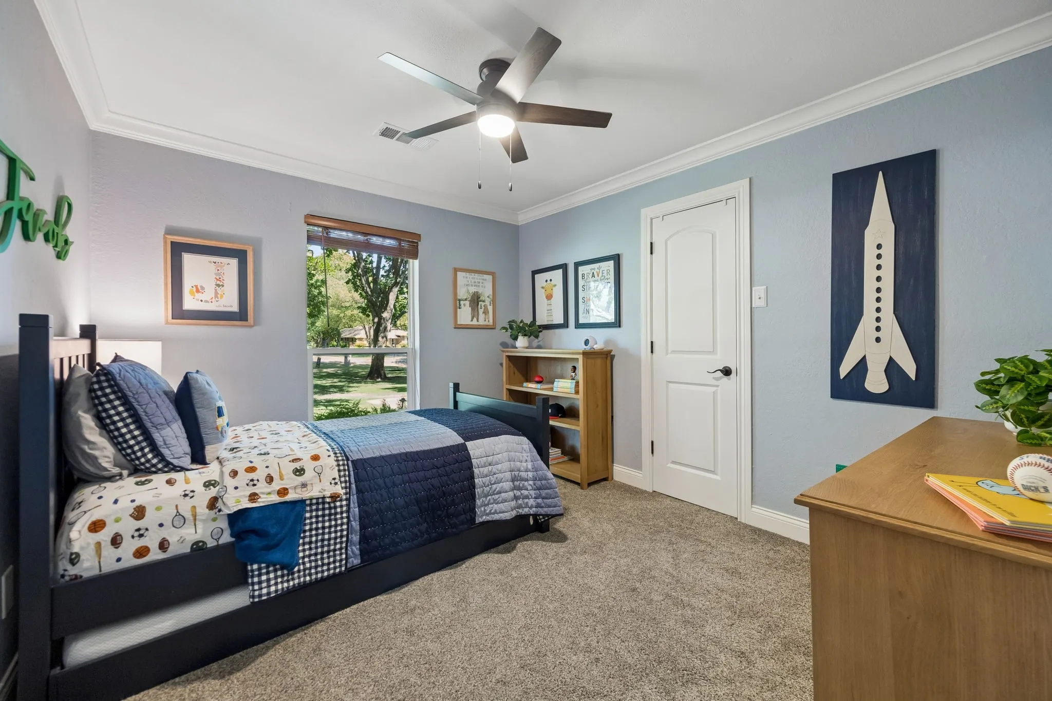Secondary bedroom. 1 of 3 bedrooms located downstairs.