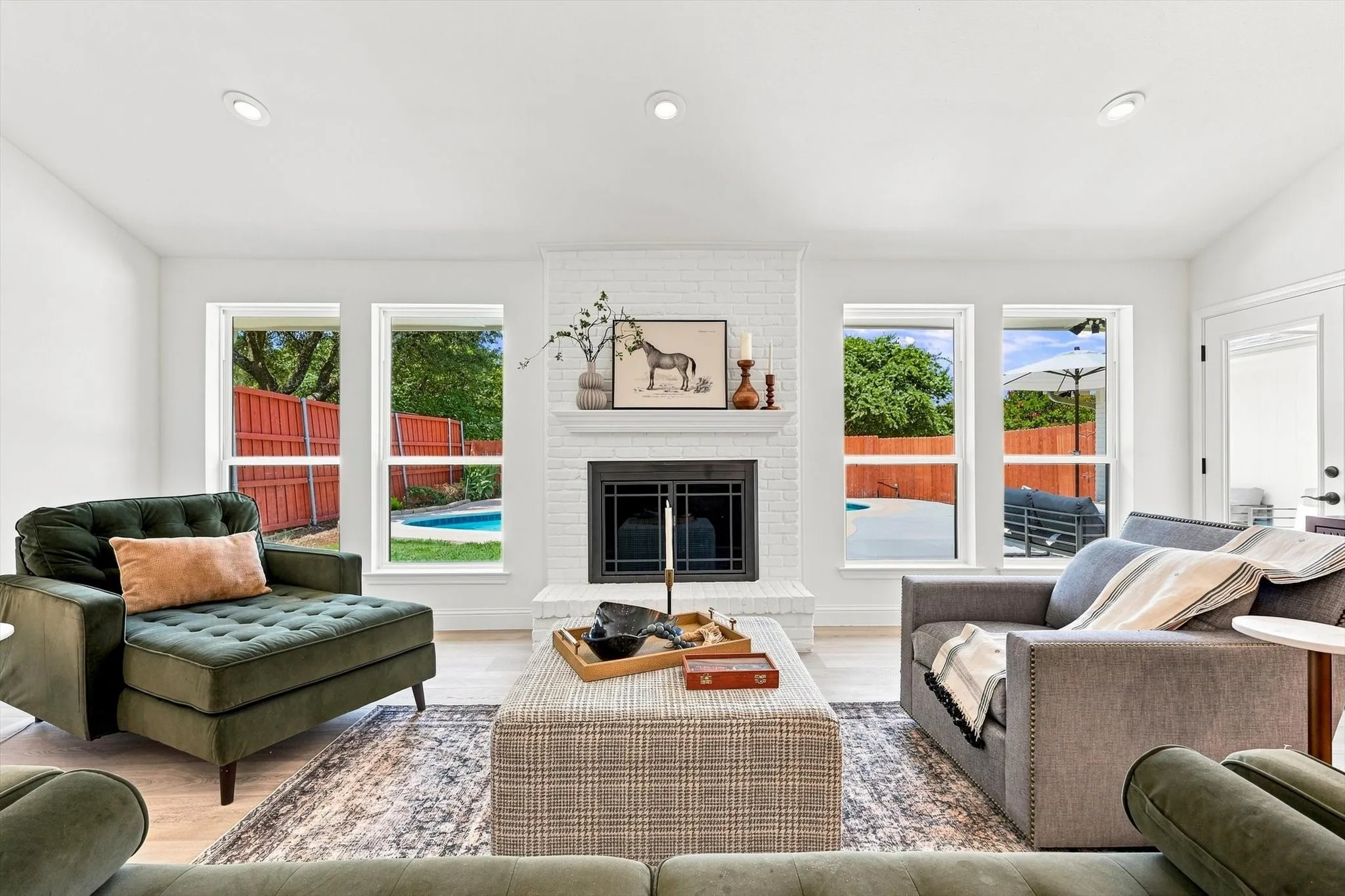 Wam setting with views of backyard with swimming pool