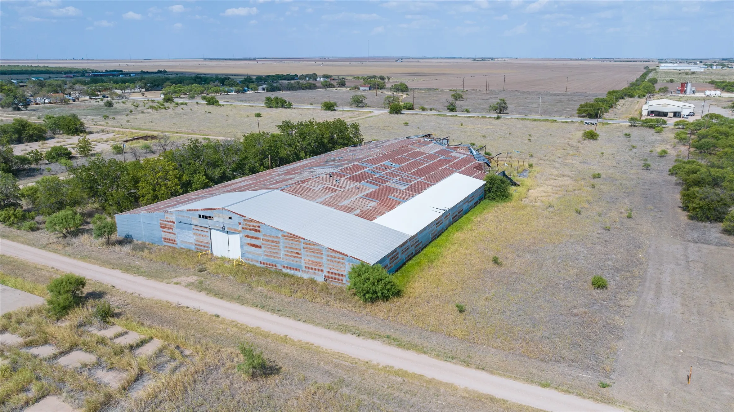 Large metal-sided structure with a metal roof