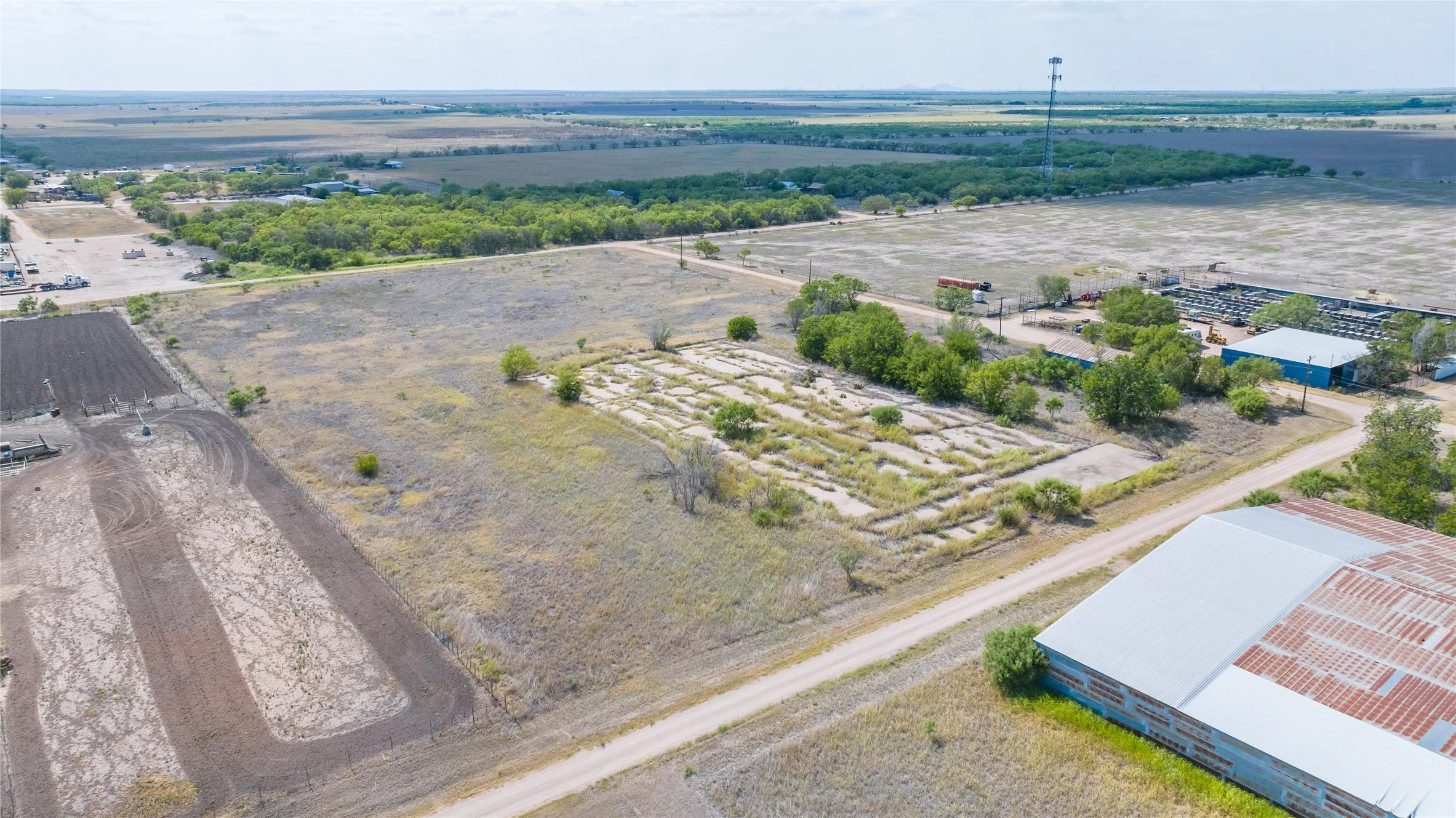 Expansive undeveloped land featuring a mix of cleared areas and natural vegetation