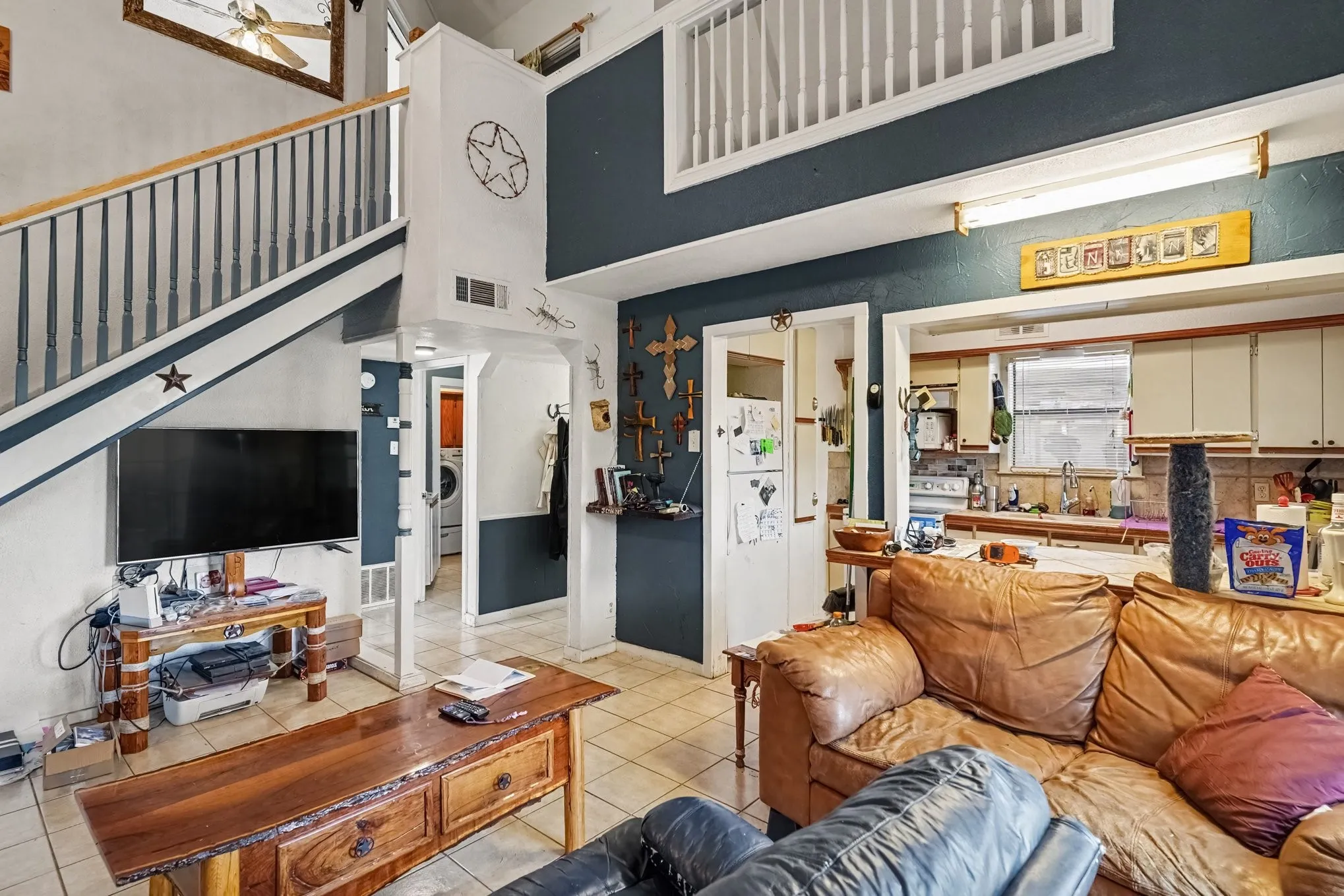 Broad view of the open main living area looking out from under the loft overhang.