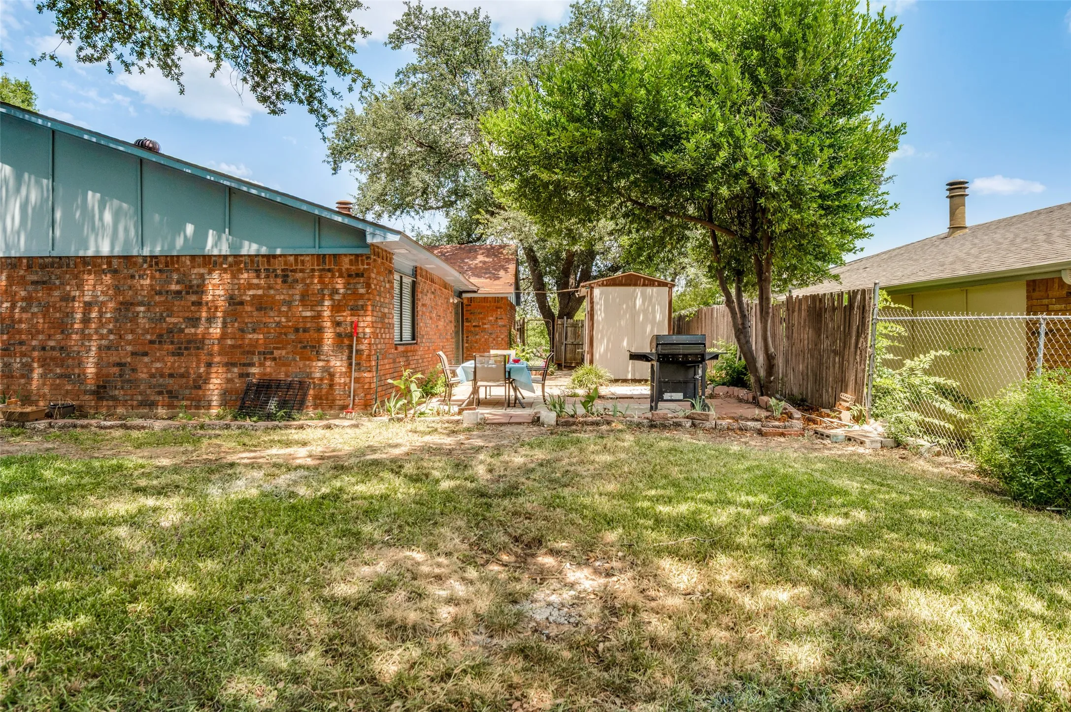 The large backyard will host a soccer game, volleyball or any other activity that needs room.